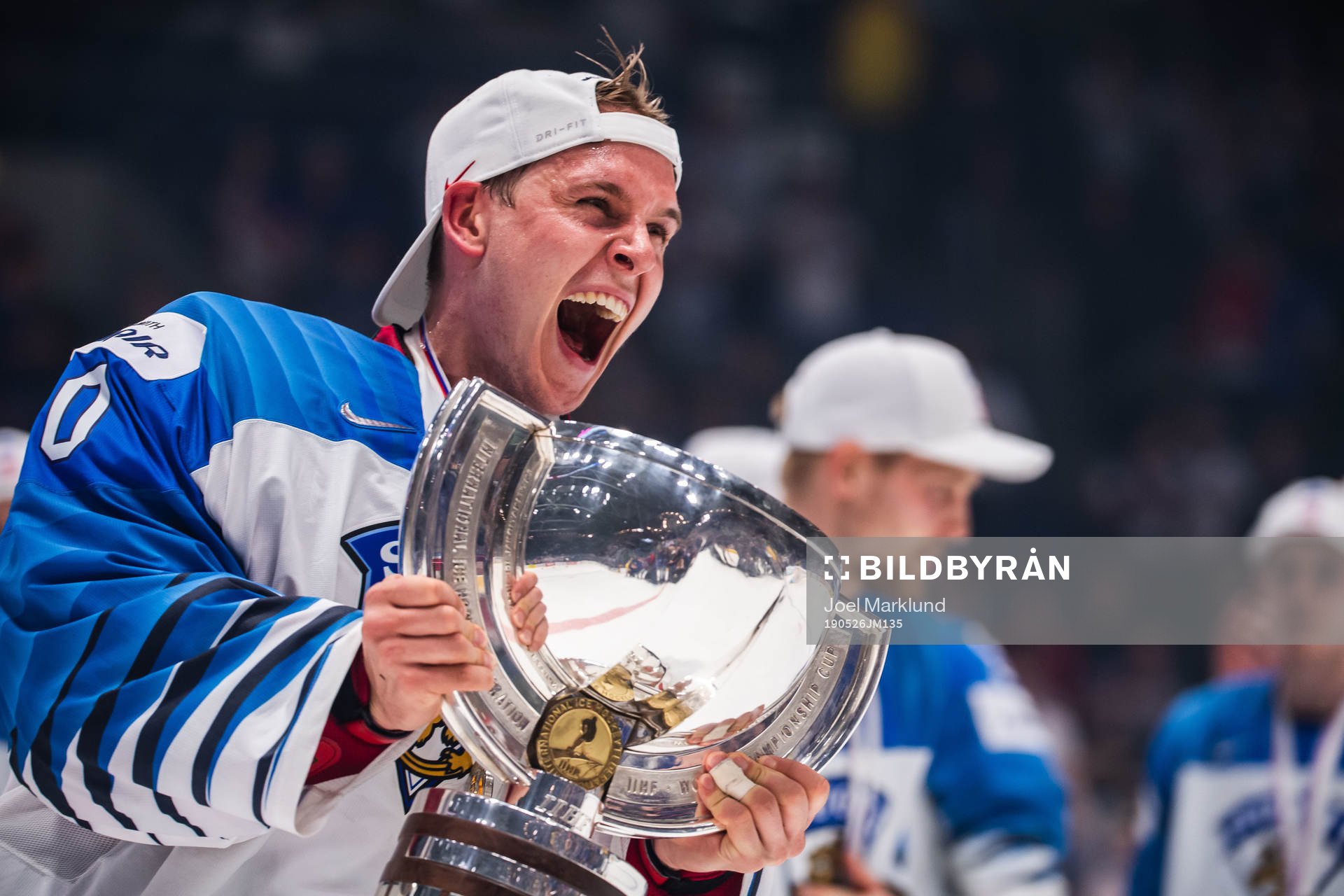 Goaltender Kevin Lankinen of Finland celebrates with the