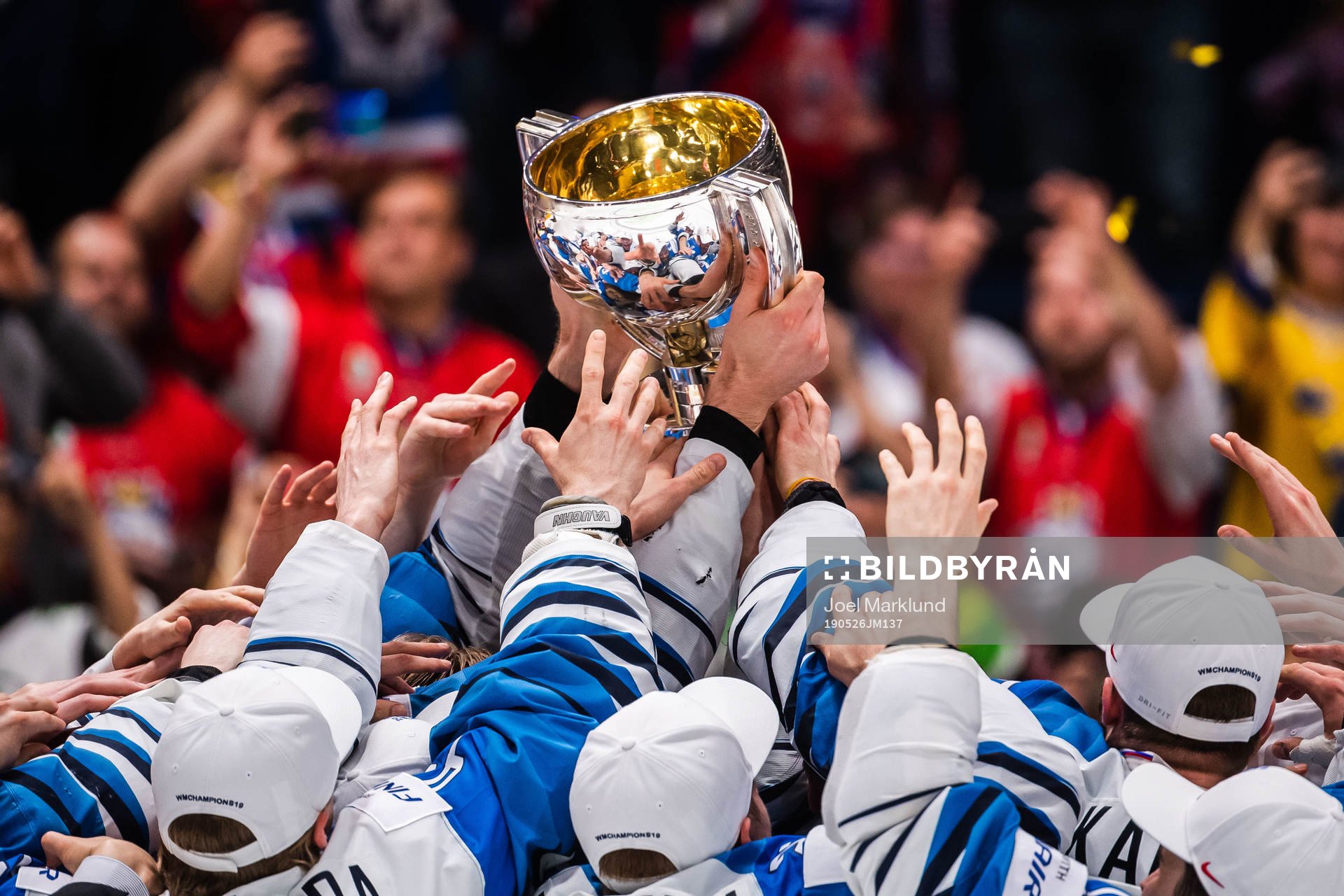 Players of Finland celebrates with the trophy
