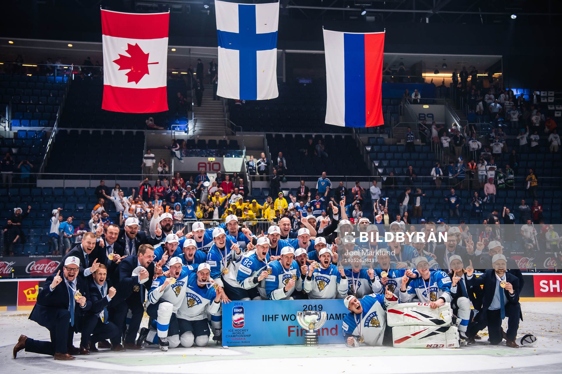 Players of Finland celebrates with the trophy