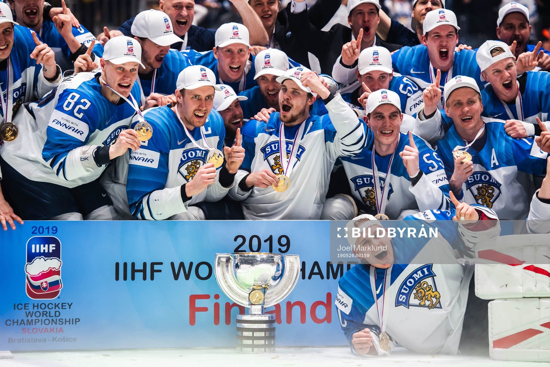 Players of Finland celebrates with the trophy
