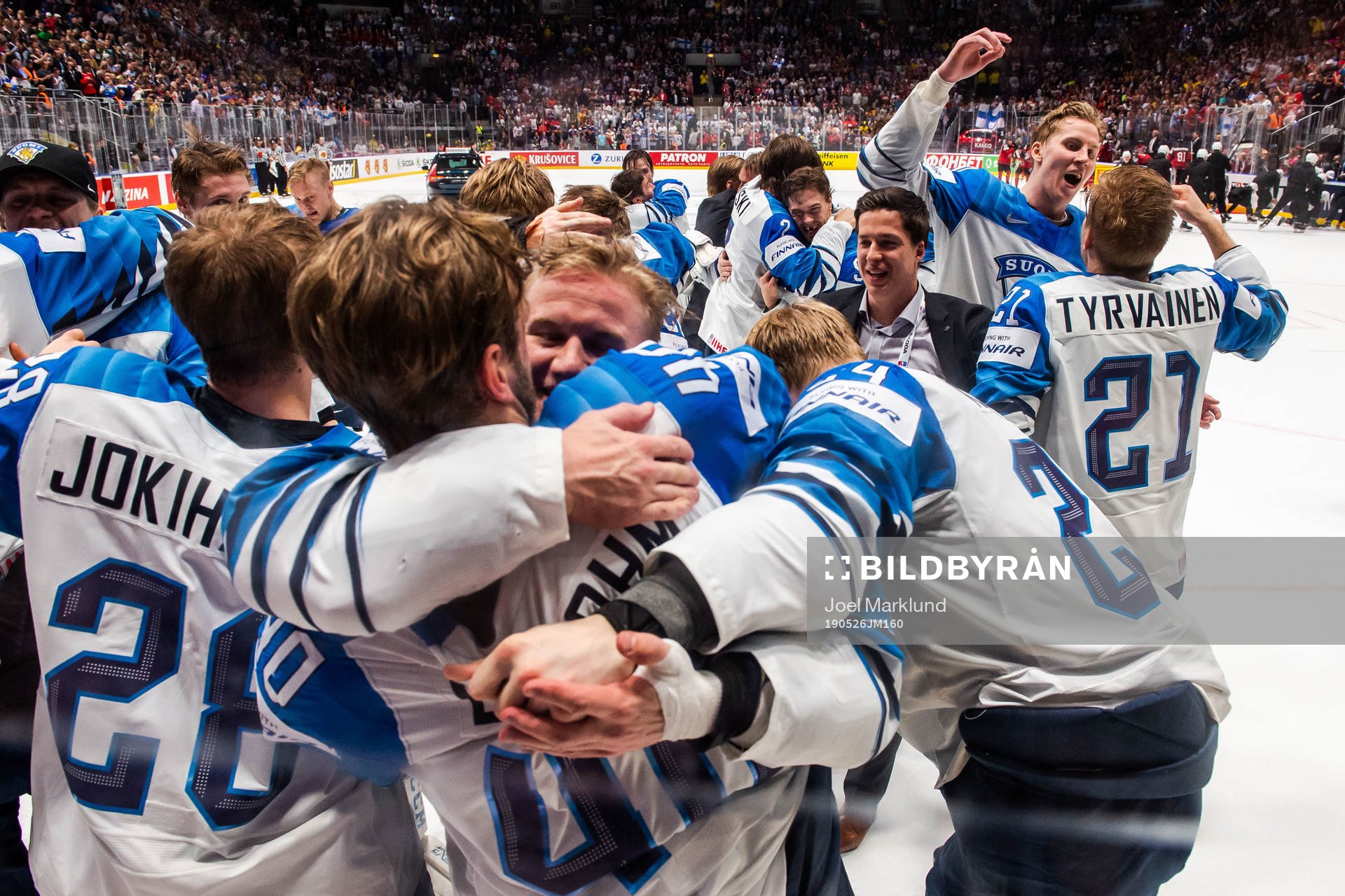 Henri Jokiharju and Juhani Tyrväinen of Finland celebrate
