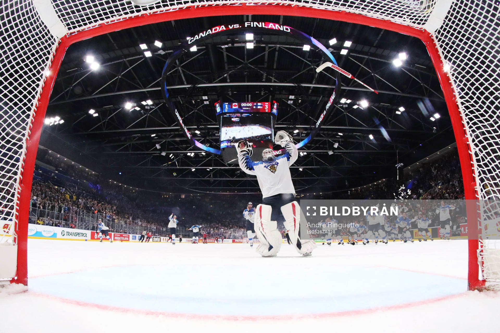 Goaltender Kevin Lankinen of Finland celebrates his team's
