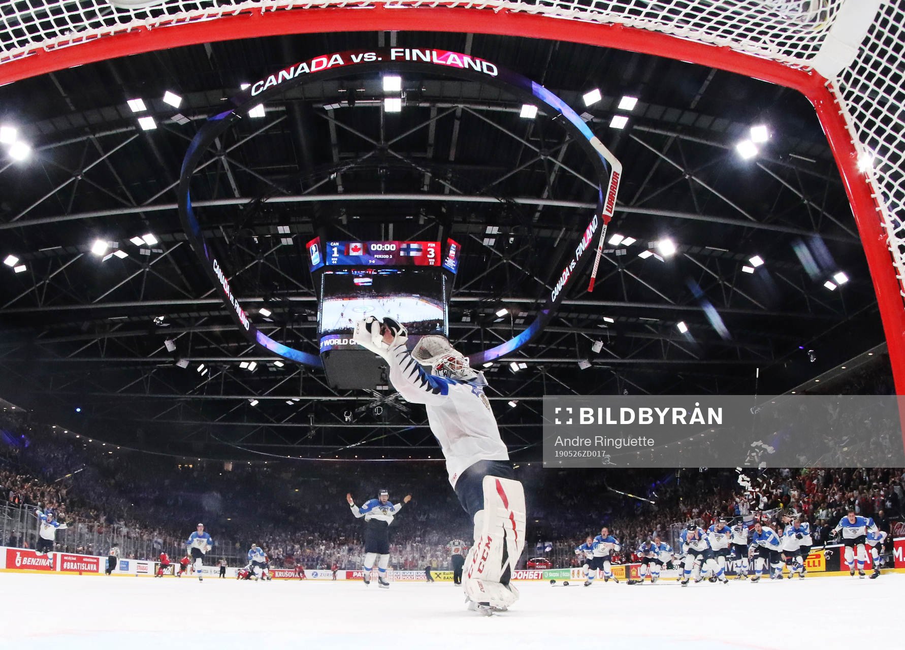 Goaltender Kevin Lankinen of Finland celebrates his team's