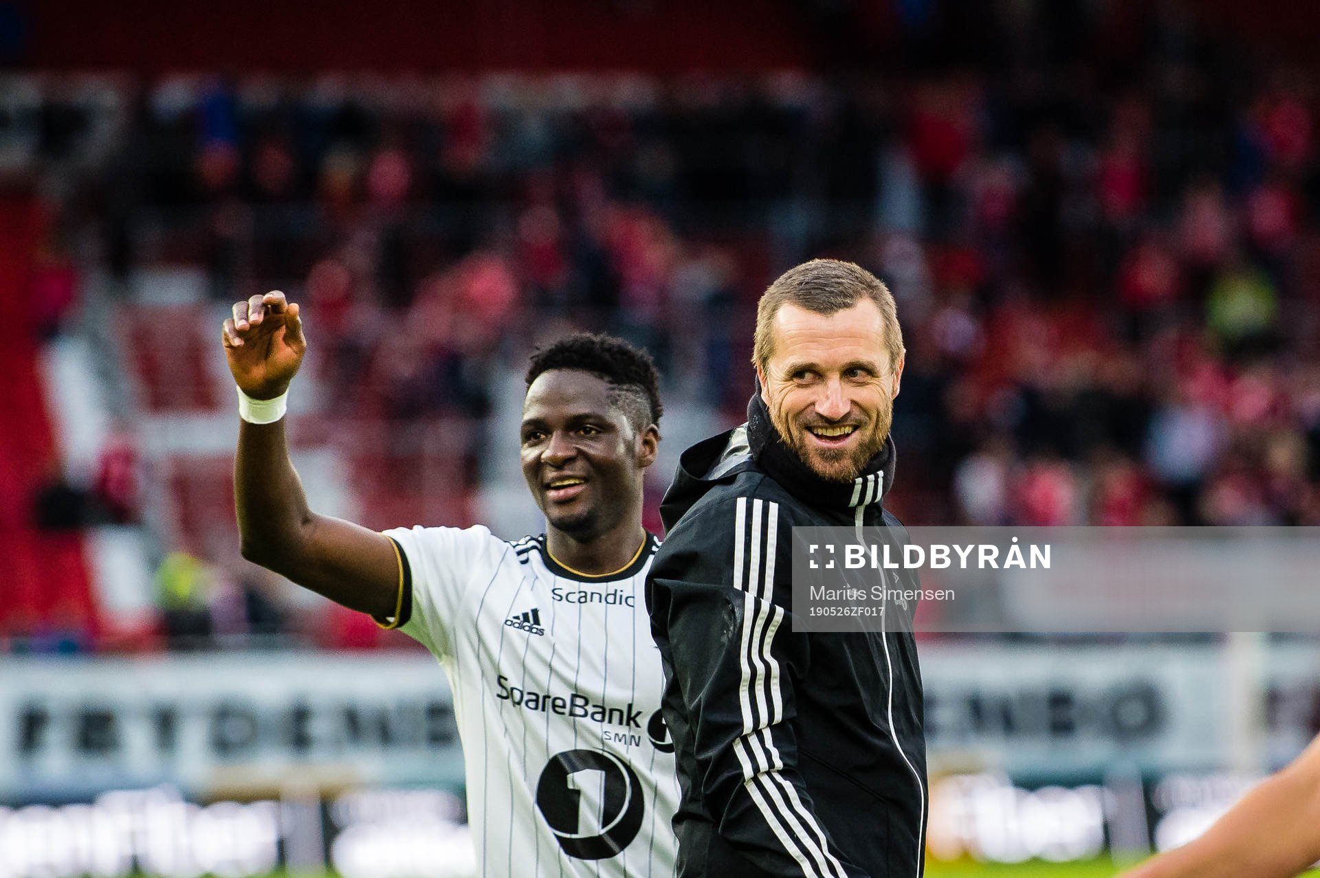Babajide David Akintola of Rosenborg and Eirik Horneland, head coach of Rosenborg, celebrates after the Eliteserien match between Brann and Rosenborg on May 26, 2019 in Bergen.