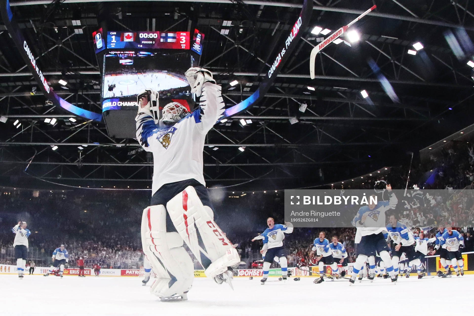 Goaltender Kevin Lankinen of Finland celebrates his team's
