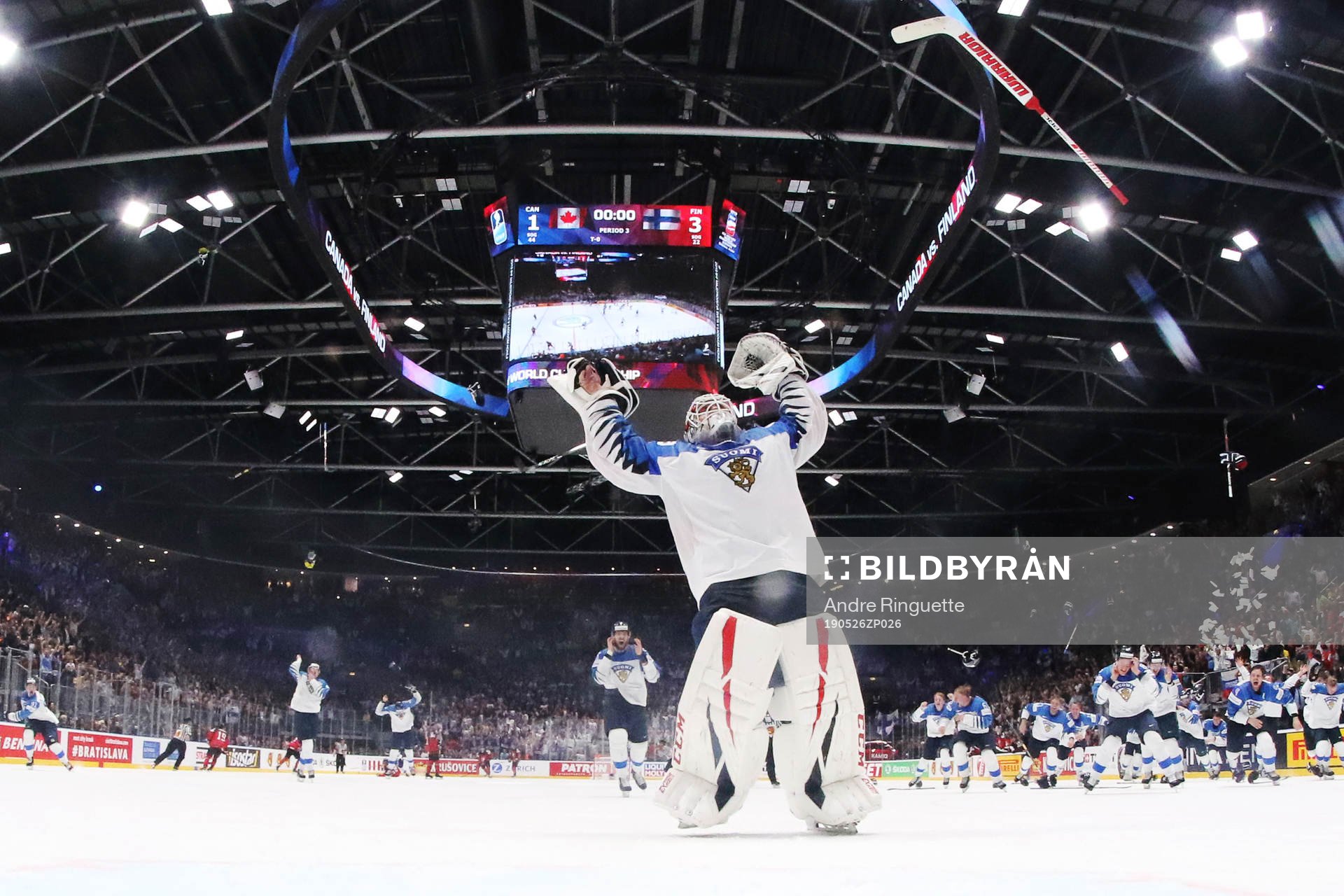 Goaltender Kevin Lankinen of Finland celebrates his team's