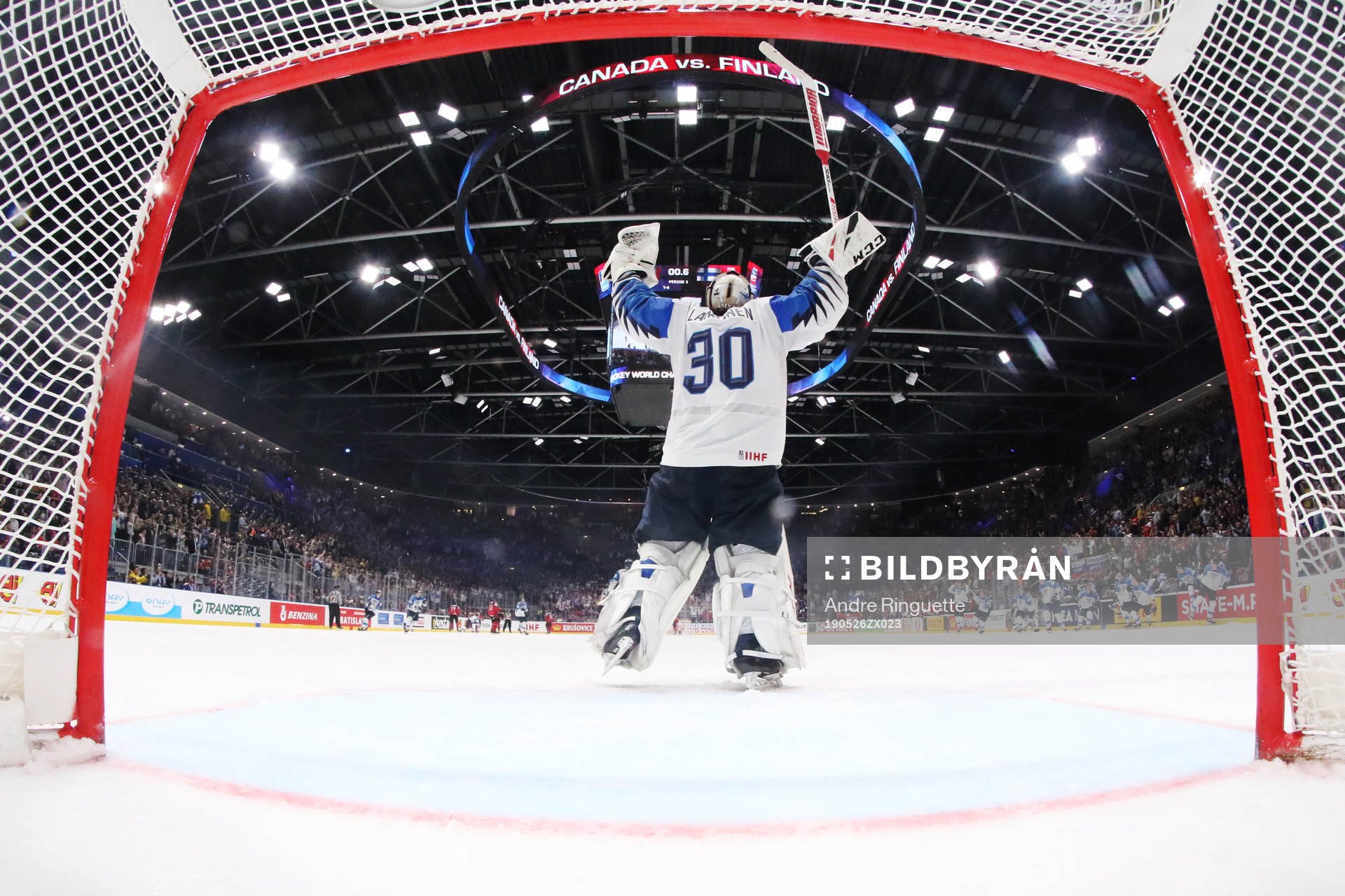 Goaltender Kevin Lankinen of Finland celebrates his team's