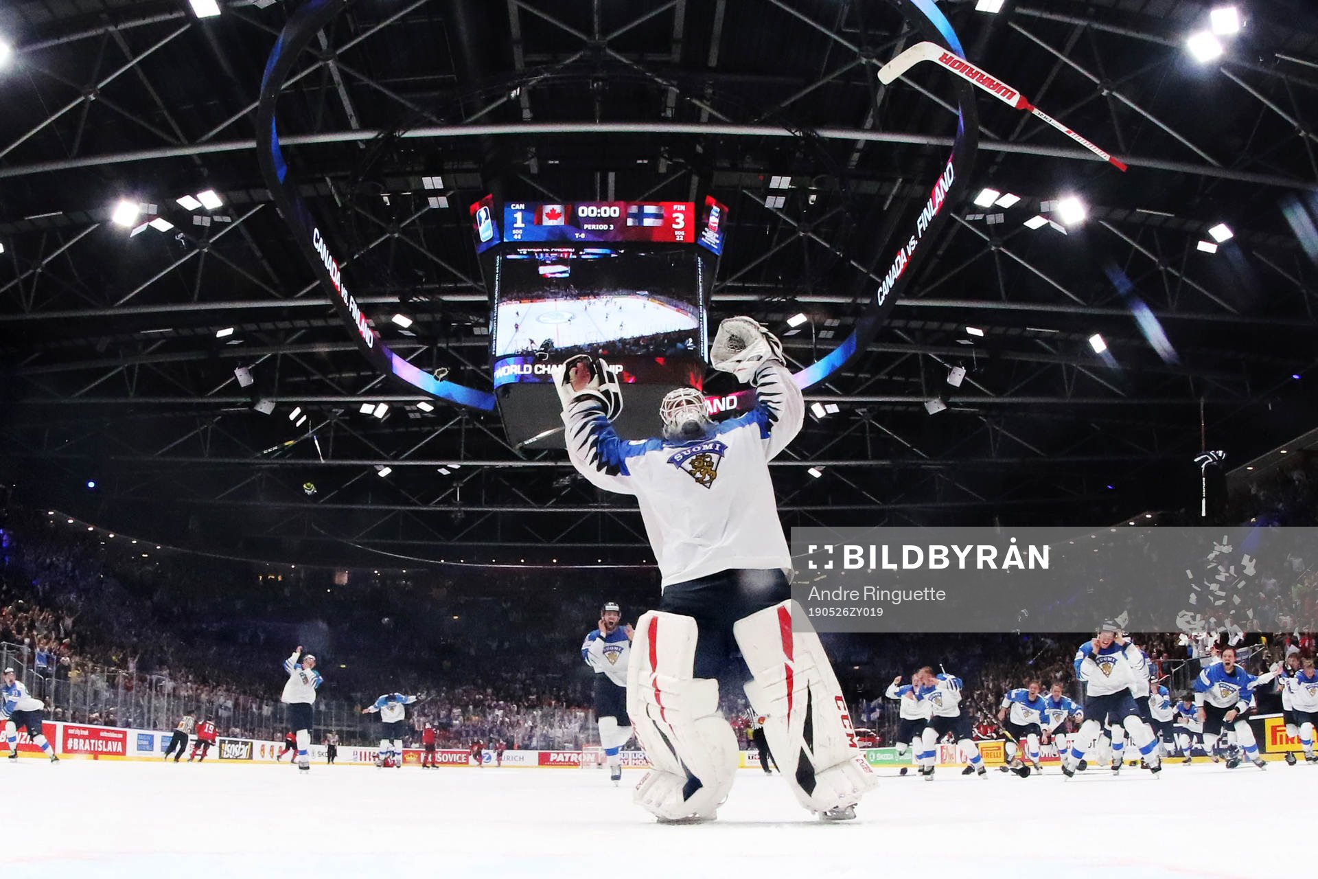 Goaltender Kevin Lankinen of Finland celebrates his team's