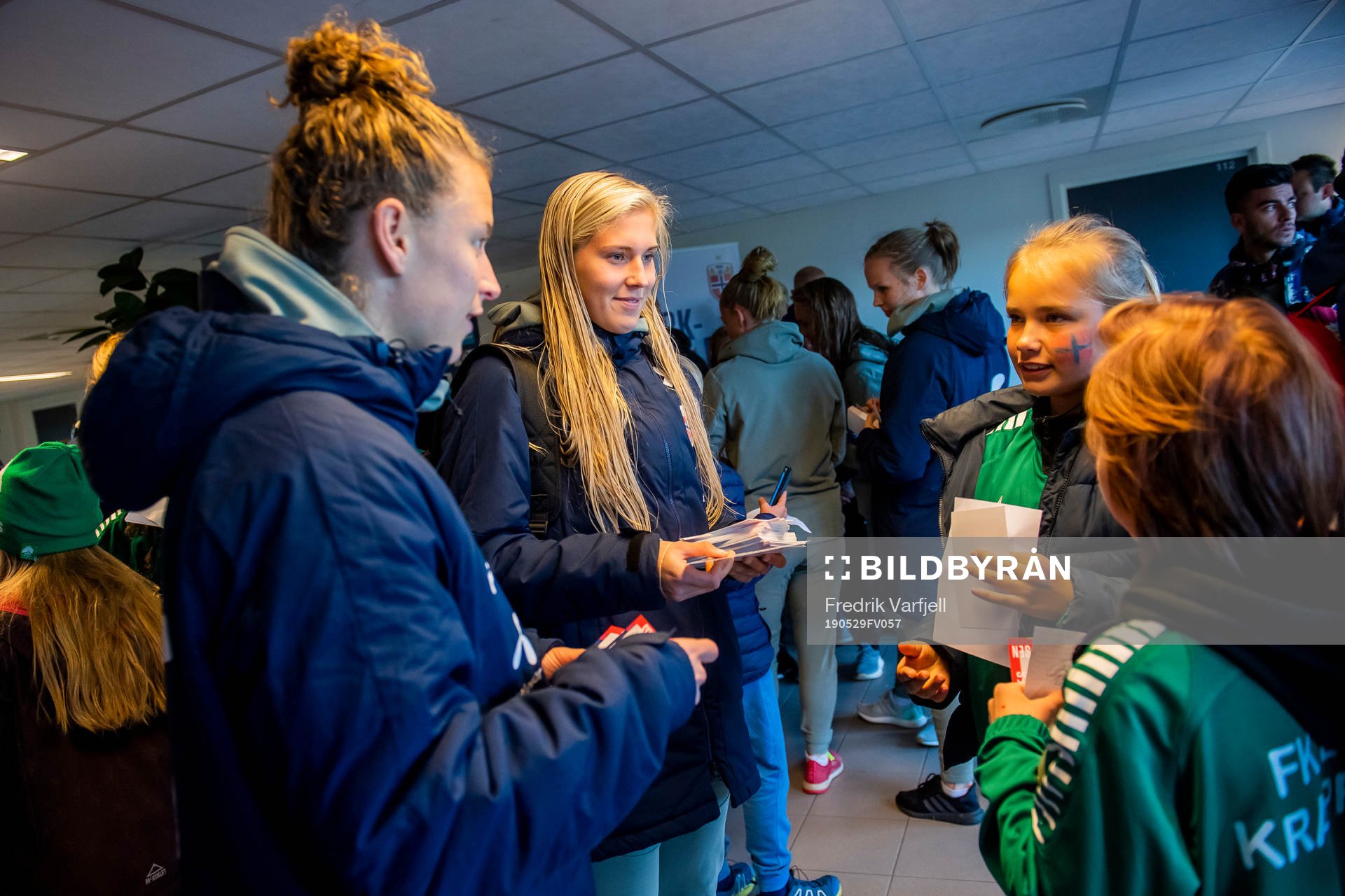 Synne Skinnes Hansen and Emilie Nautnes of Norway with fans