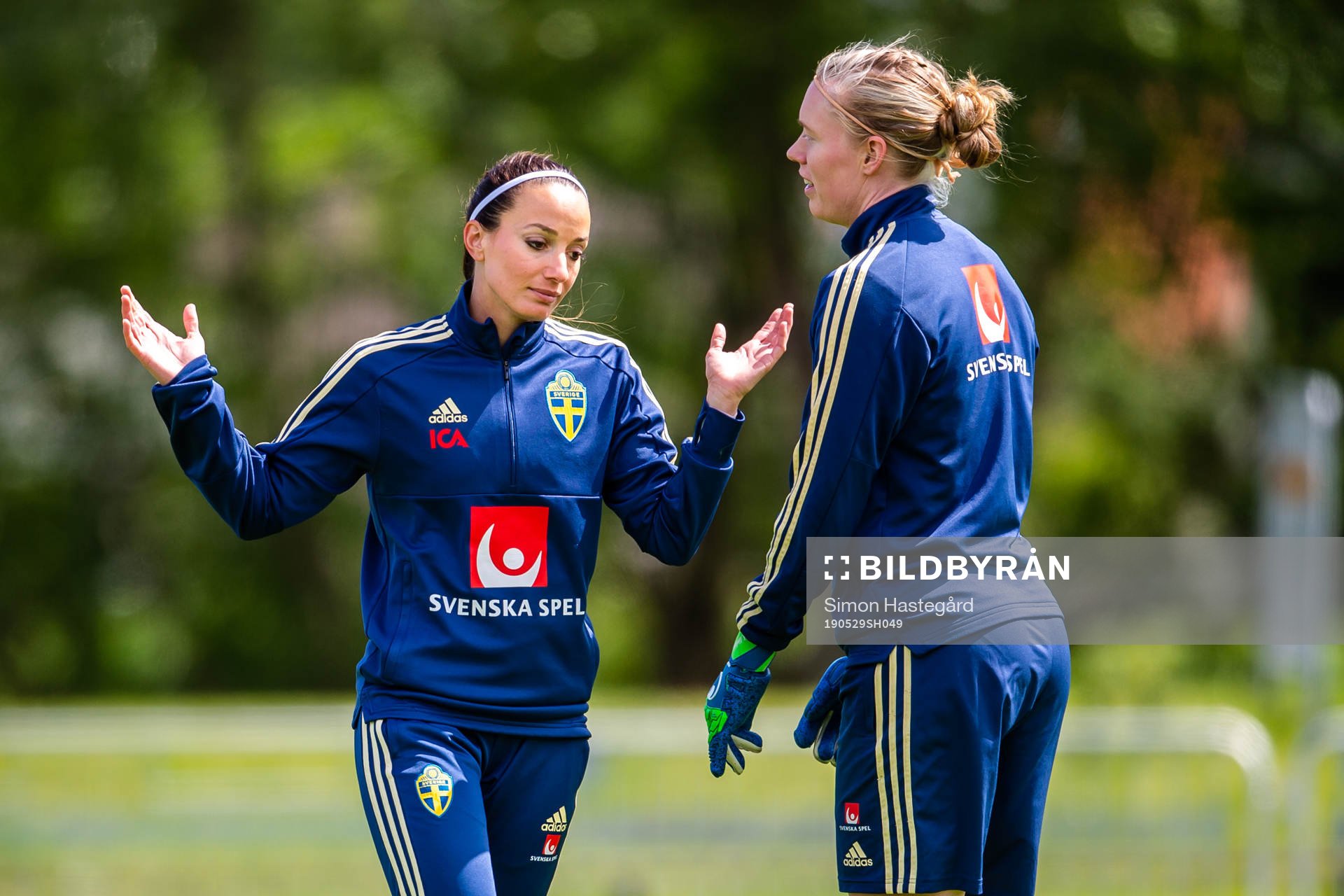 Kosovare Asllani and goalkeeper Hedvig Lindahl of Swedish