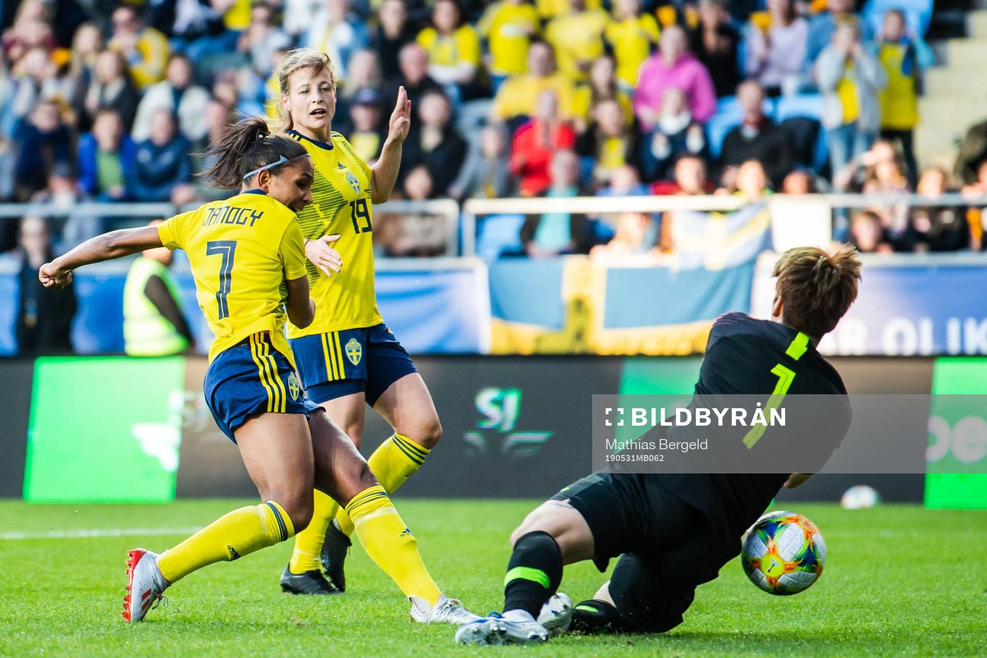 Madelen Janogy of Sweden scores 1-0 behind goalkeeper Gaae