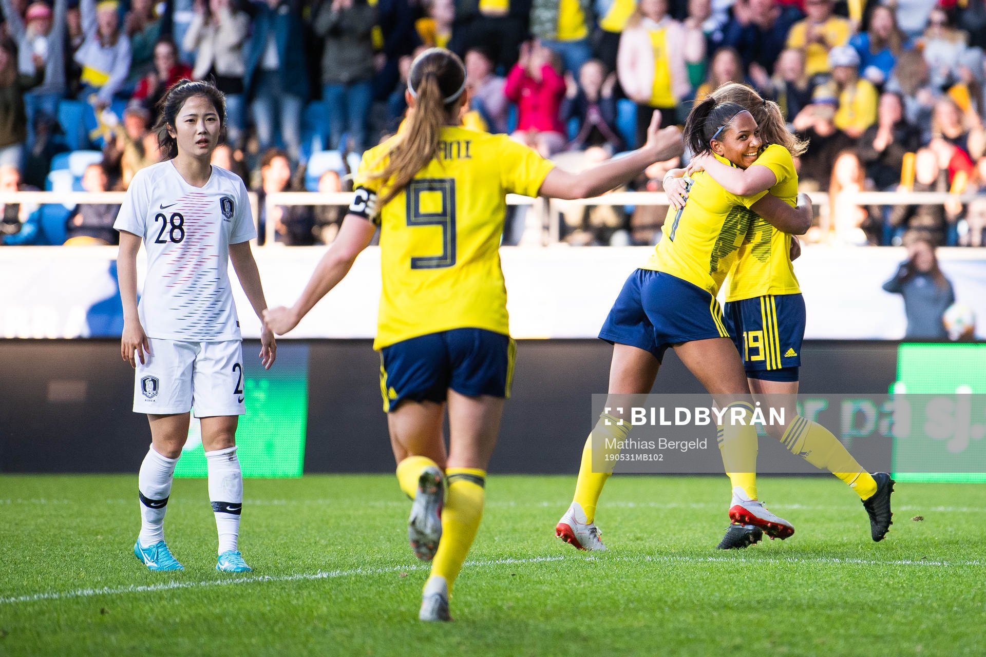 Mina Lee of South Korea looks dejected while Madelen Janogy