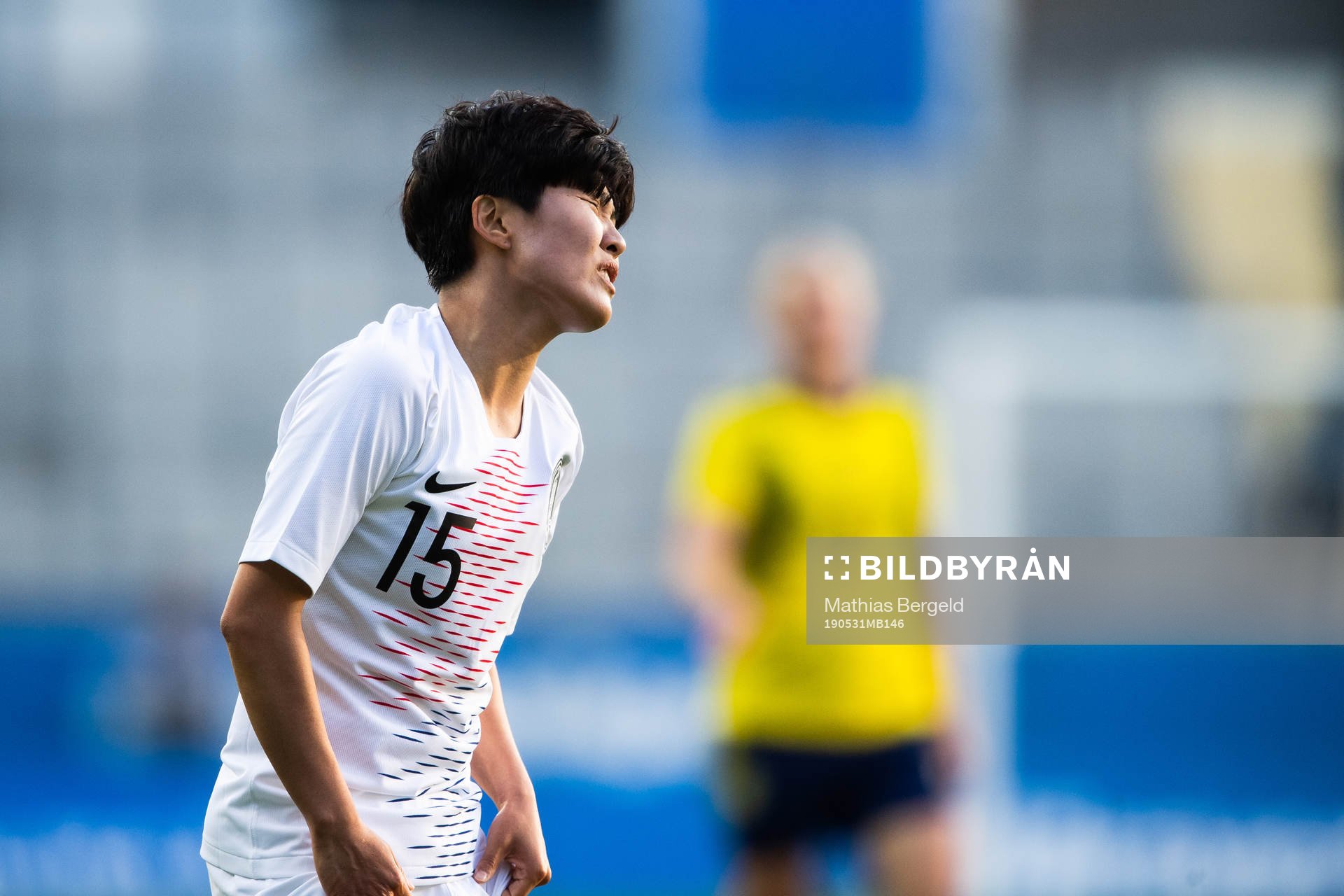Youngju Lee of South Korea looks dejected