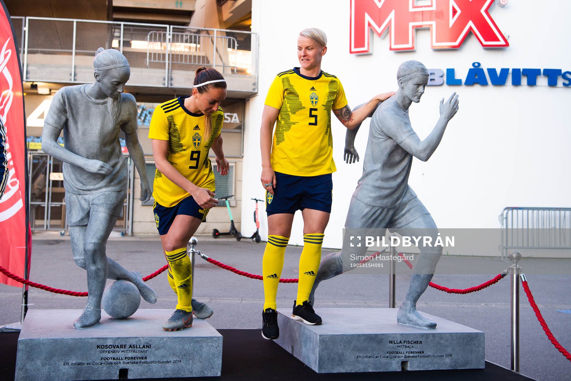 Kosovare Asllani and Nilla Fischer of Sweden poses for a