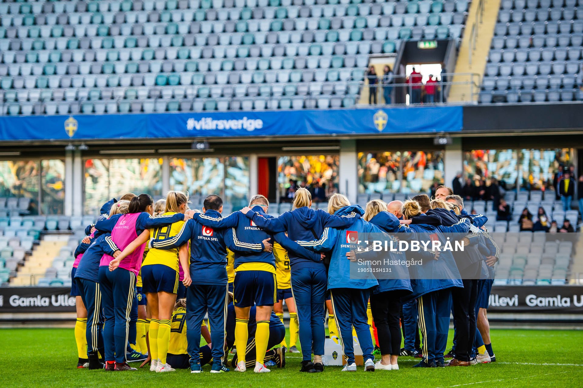 Players and staff gathered