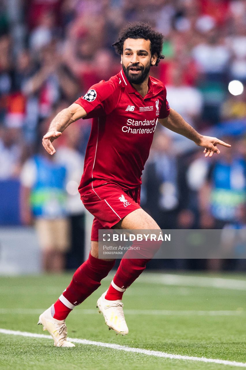 Mohamed Salah of Liverpool celebrates scoring 0-1