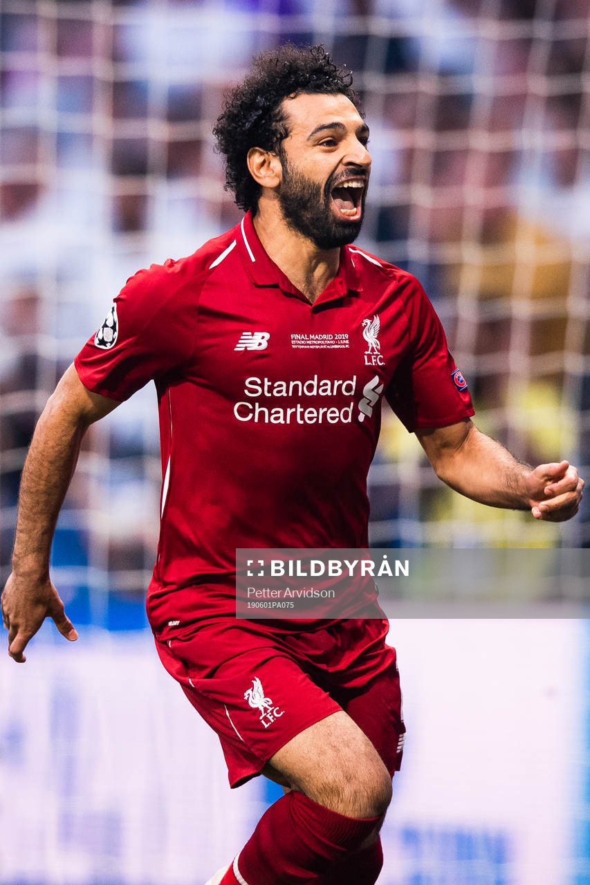 Mohamed Salah of Liverpool celebrates scoring 0-1