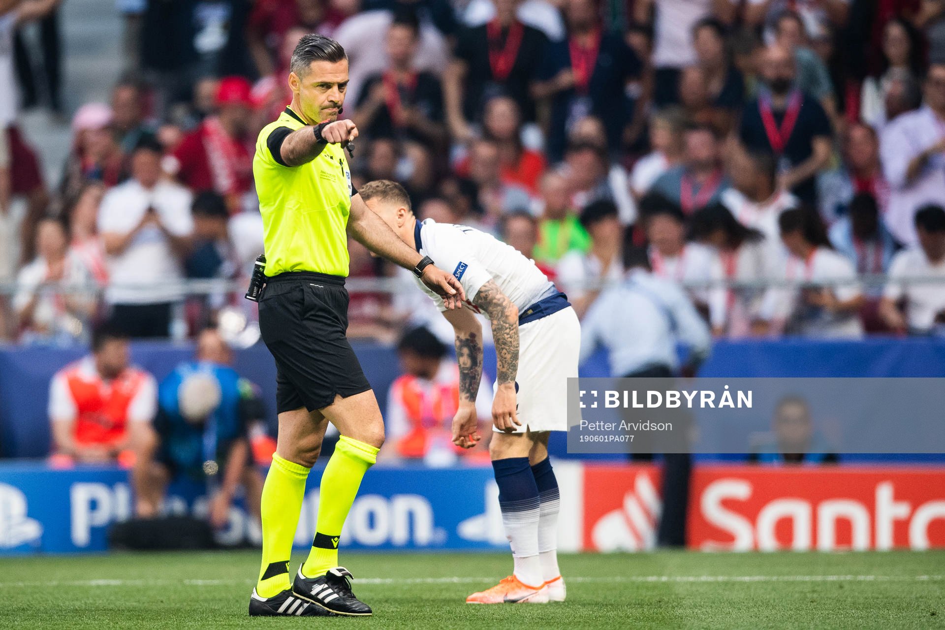 Referee Damir Skomina calls a penalty for Liverpool