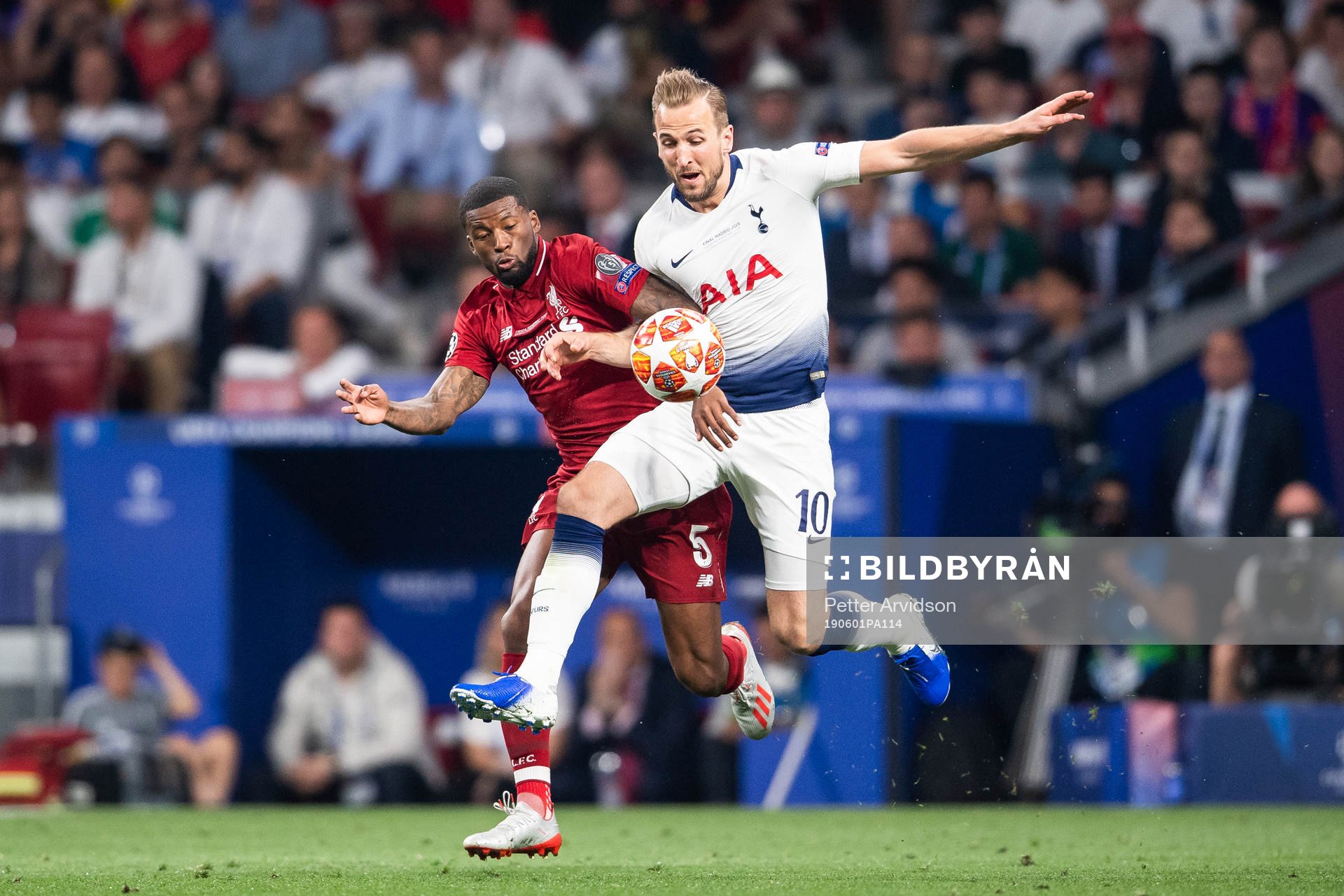 Georginio Wijnaldum of Liverpool and Harry Kane of