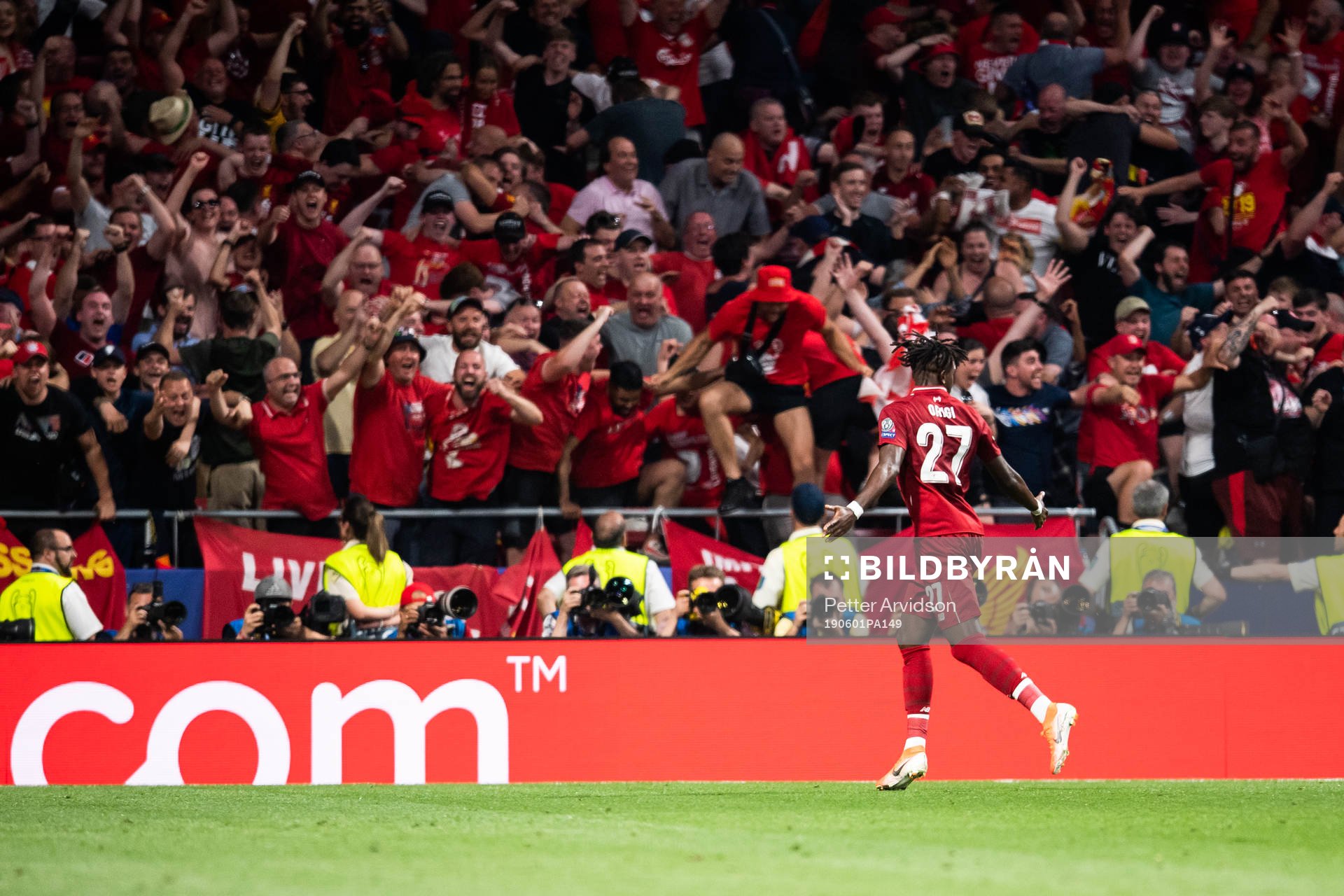 Divock Origi of Liverpool celebrates scoring 0-2