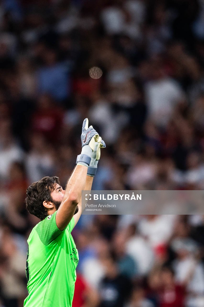 Goalkeeper Alisson Becker of Liverpool celebrates
