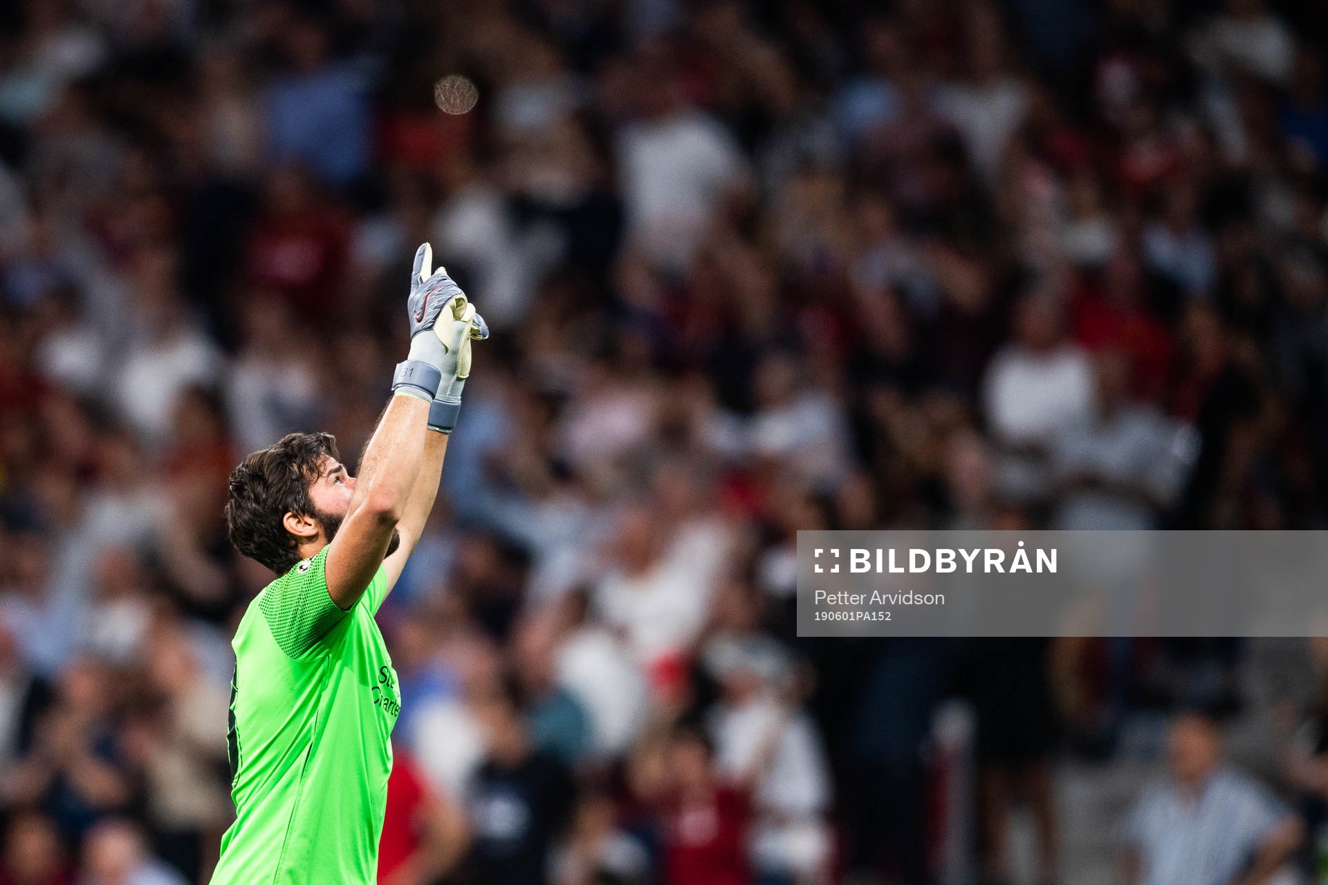 Goalkeeper Alisson Becker of Liverpool celebrates