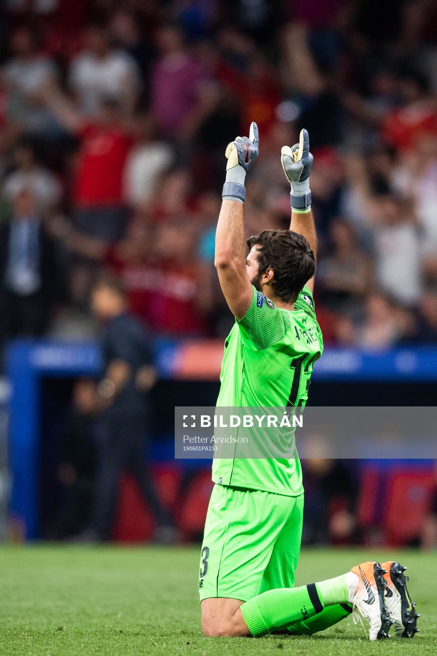 Goalkeeper Alisson Becker of Liverpool celebrates