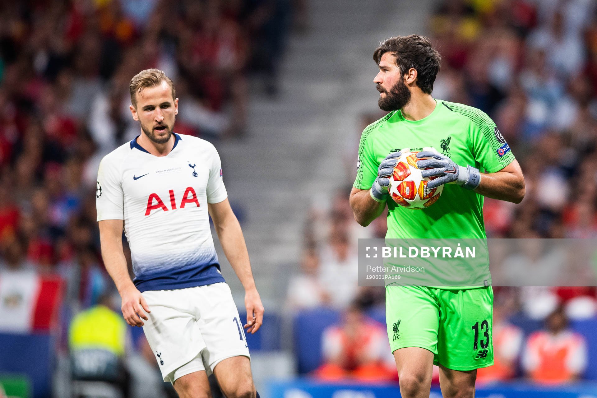 Goalkeeper Alisson Becker of Liverpool and Harry Kane of Tottenham during the UEFA Champions League final between Tottenham and Liverpool on June 1, 2019 in Madrid.