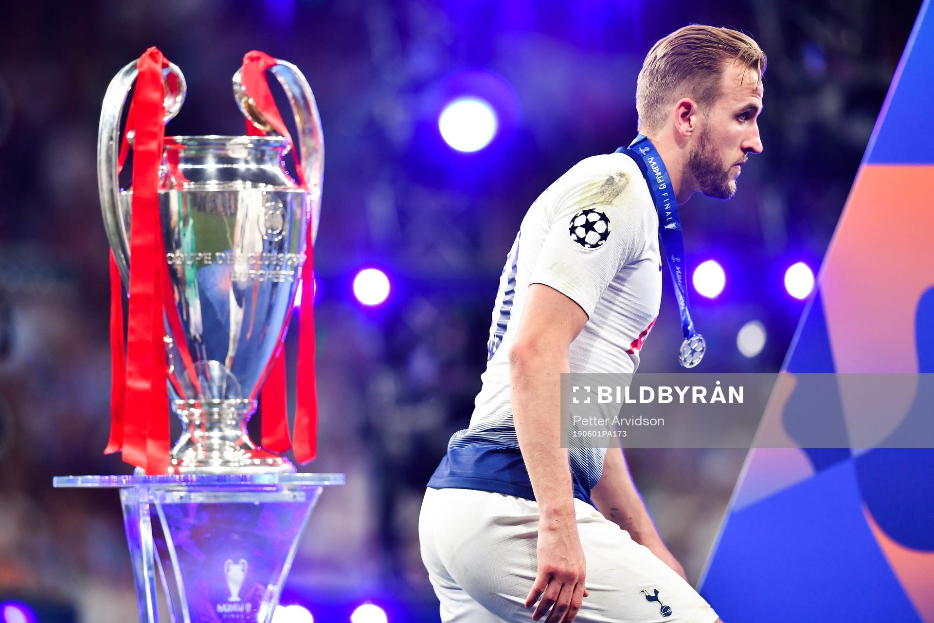 Harry Kane of Tottenham looks dejected as he walks past the