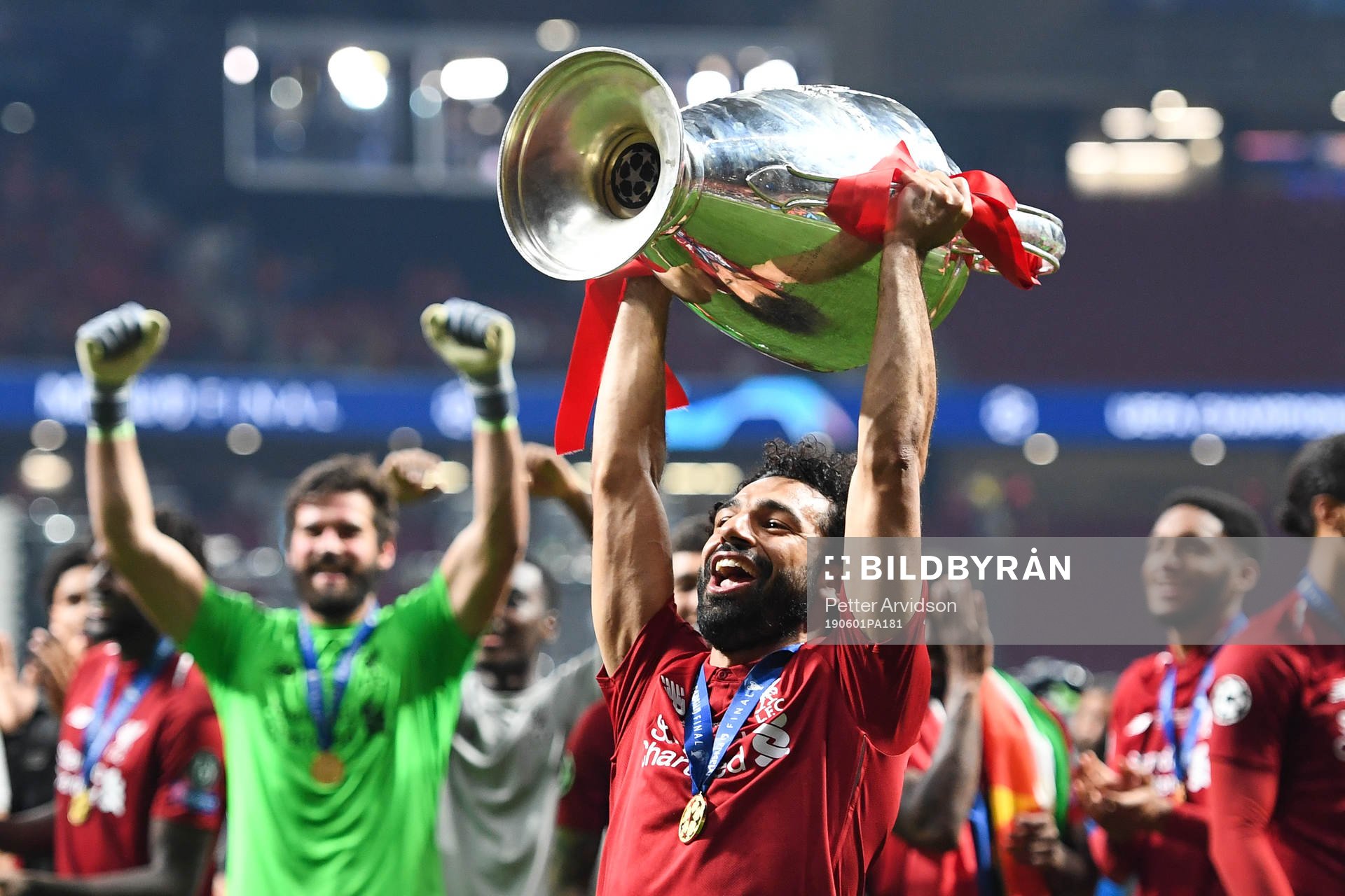 Mohamed Salah of Liverpool celebrates with the throphy