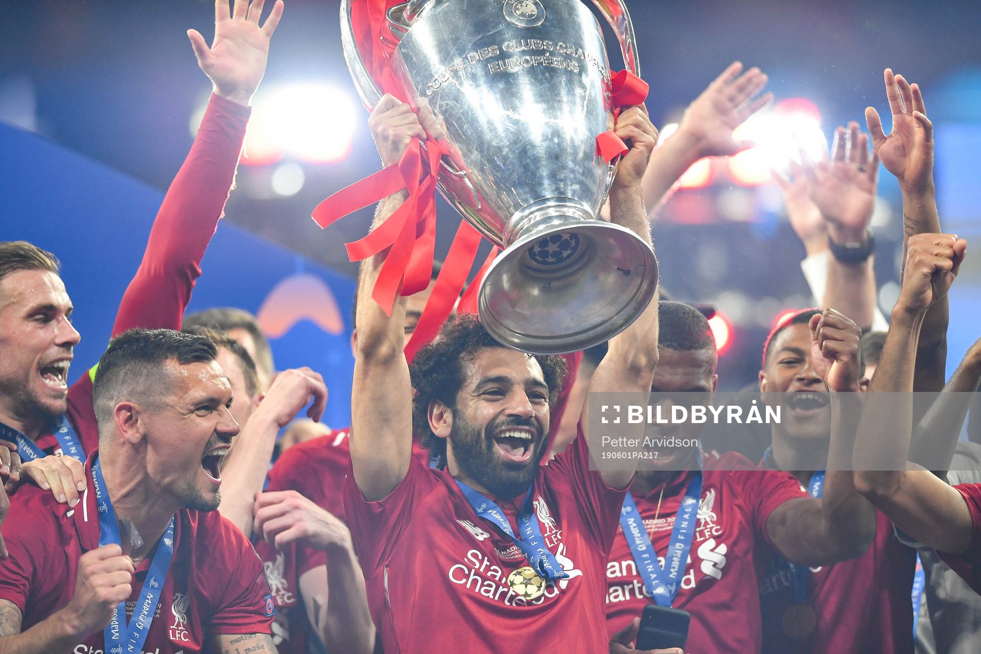 Mohamed Salah of Liverpool celebrate with the trophy