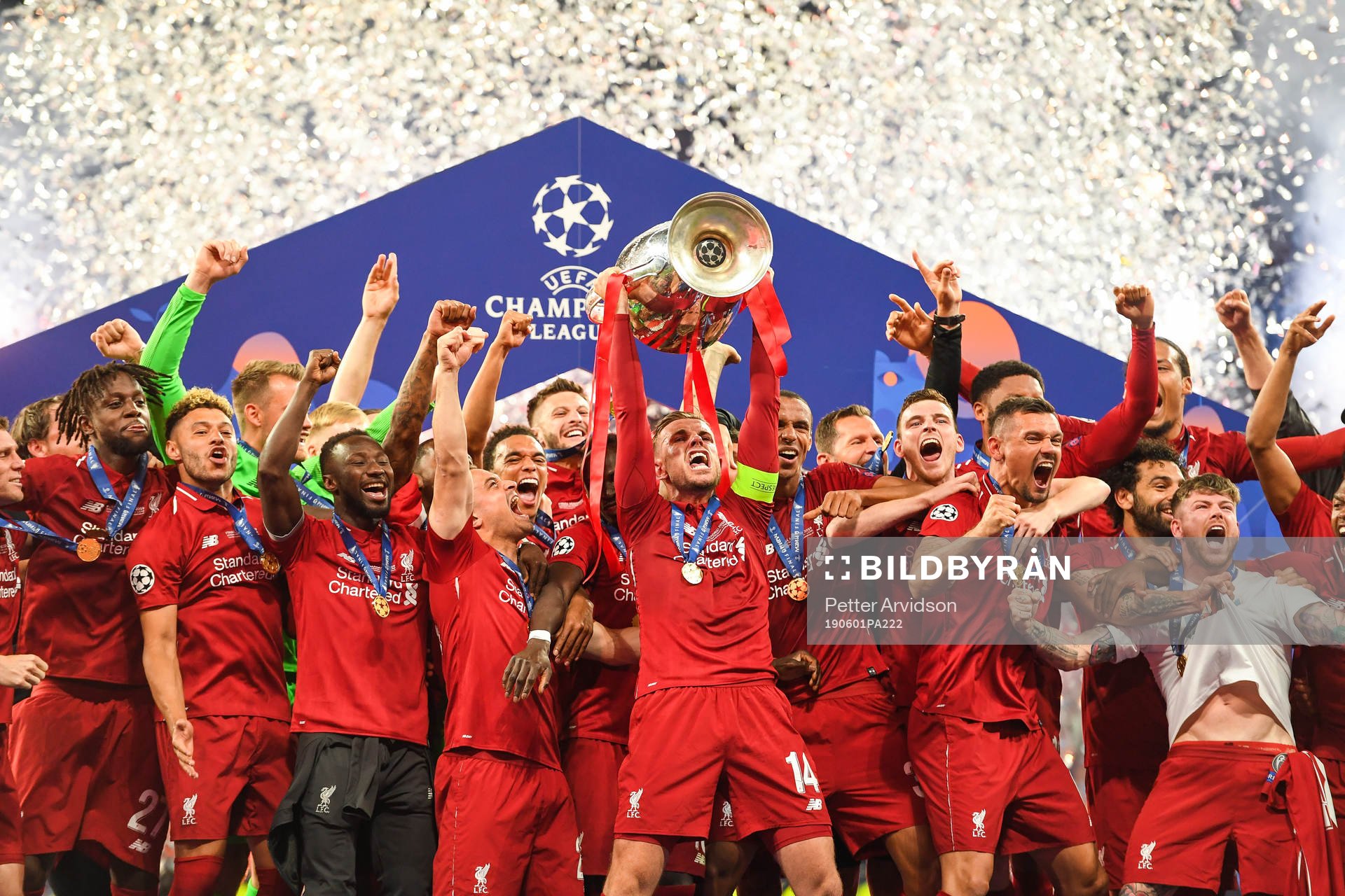 Jordan Henderson of Liverpool celebrate with the trophy