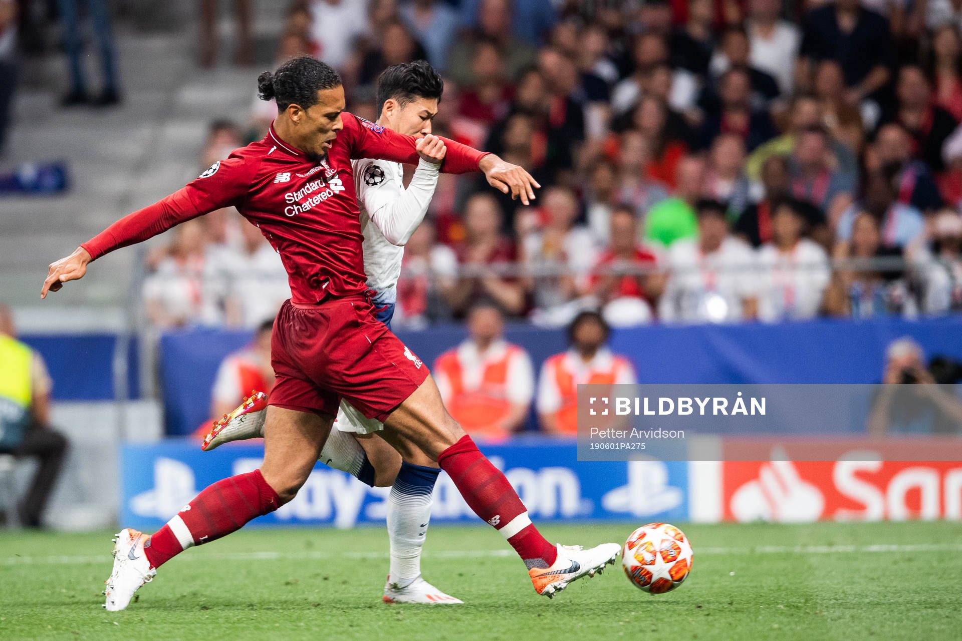 Virgil van Dijk of Liverpool and Heung-Min Son of Tottenham
