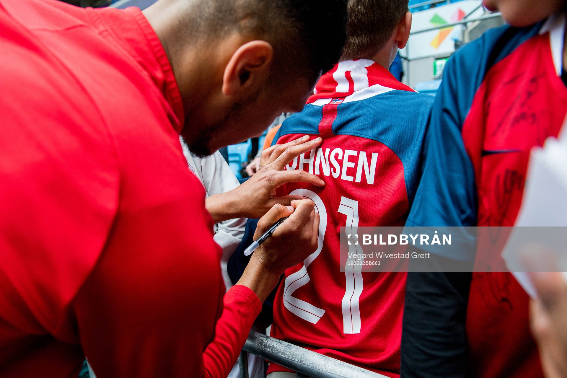 Bjørn Maars Johnsen of Norway signs his autograph