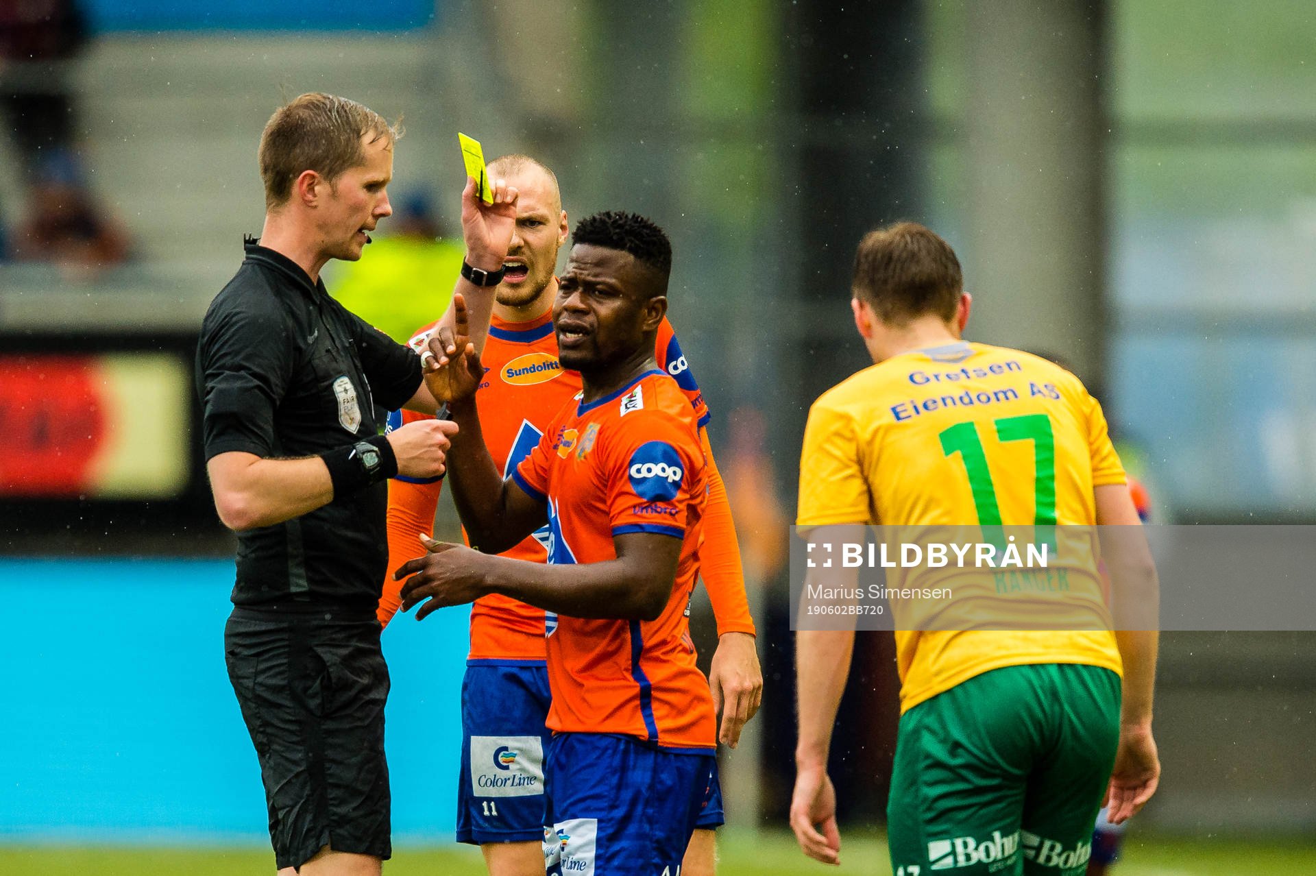 Izunna Arnest Uzochukwu of Aalesund gets a yellow card by