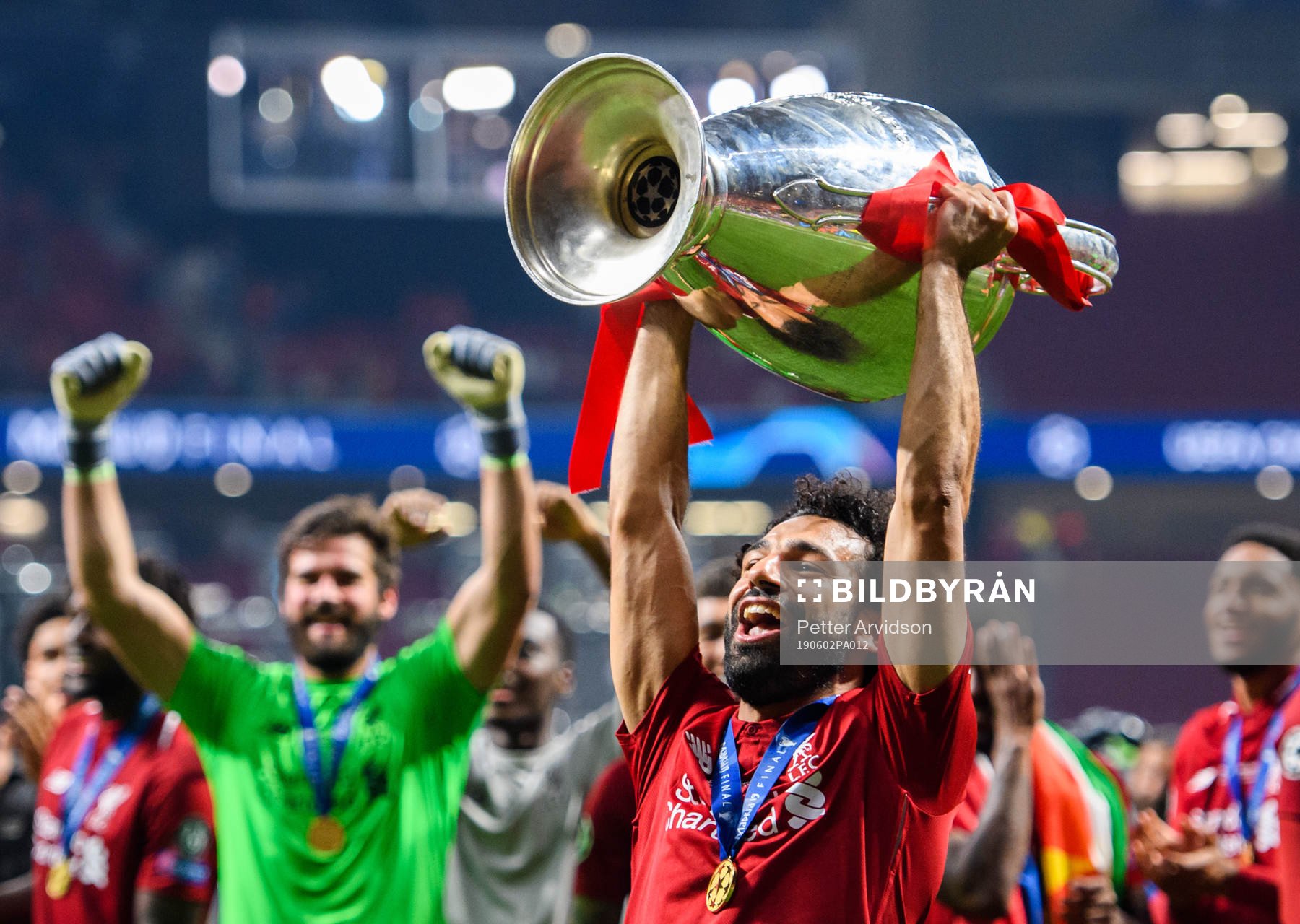 Mohamed Salah of Liverpool celebrates with the throphy