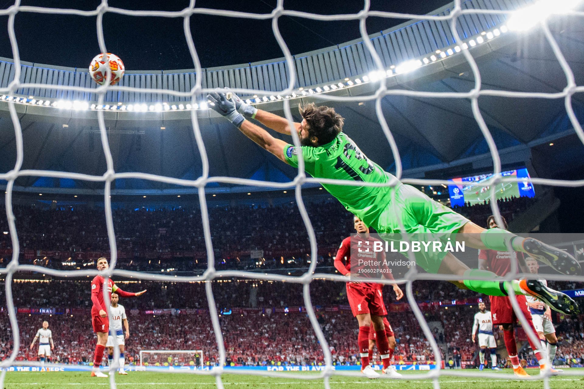 Goalkeeper Alisson Becker of Liverpool makes a save
