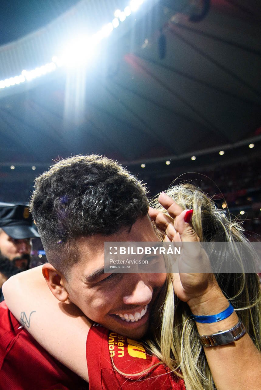 Roberto Firmino of Liverpool celebrating winning the UEFA