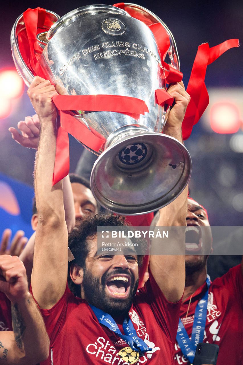Mohamed Salah of Liverpool celebrate with the trophy