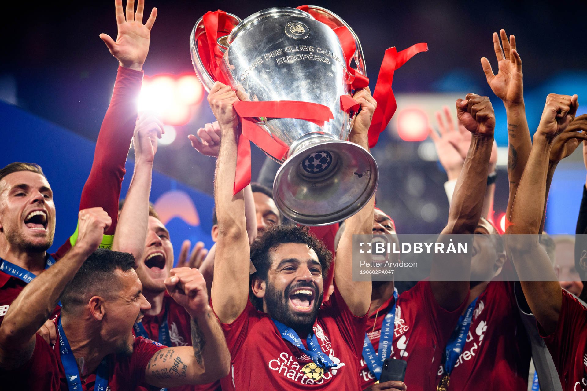 Mohamed Salah of Liverpool celebrate with the trophy