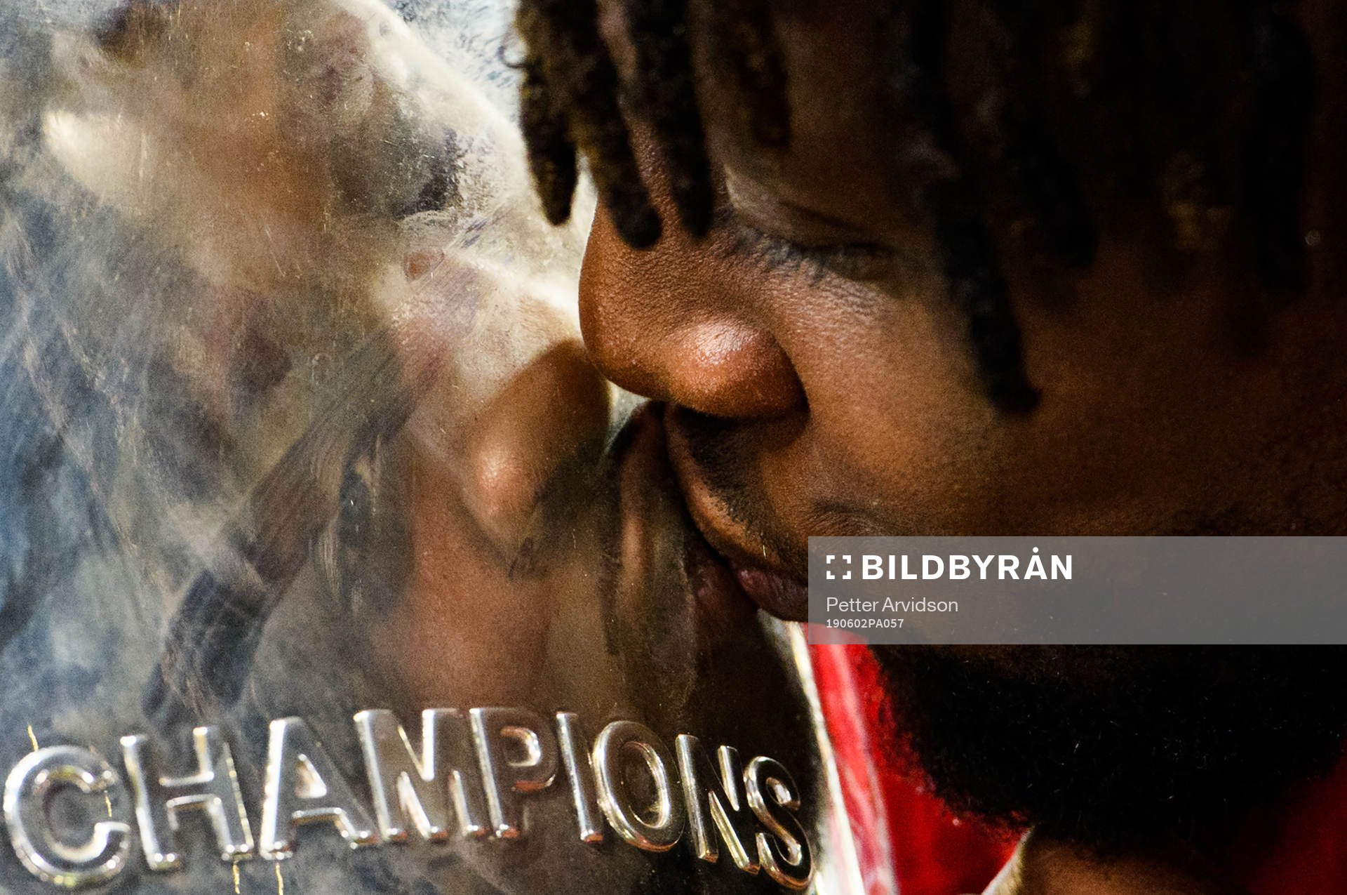 Divock Origi of Liverpool celebrate with the trophy