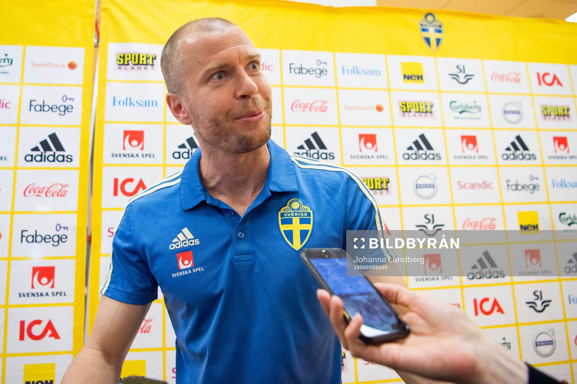 Per Karlsson of the Swedish national football team talks to