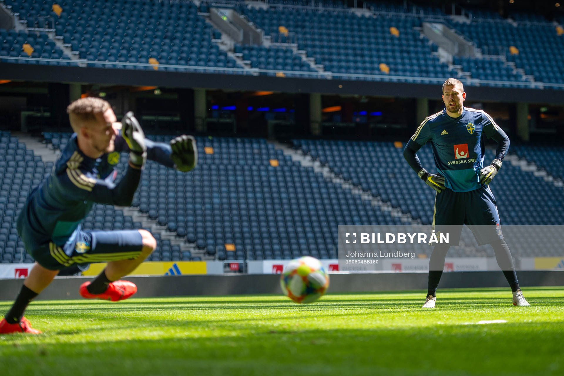 Goalkeeper Kristoffer Nordfeldt watch a save from Robin