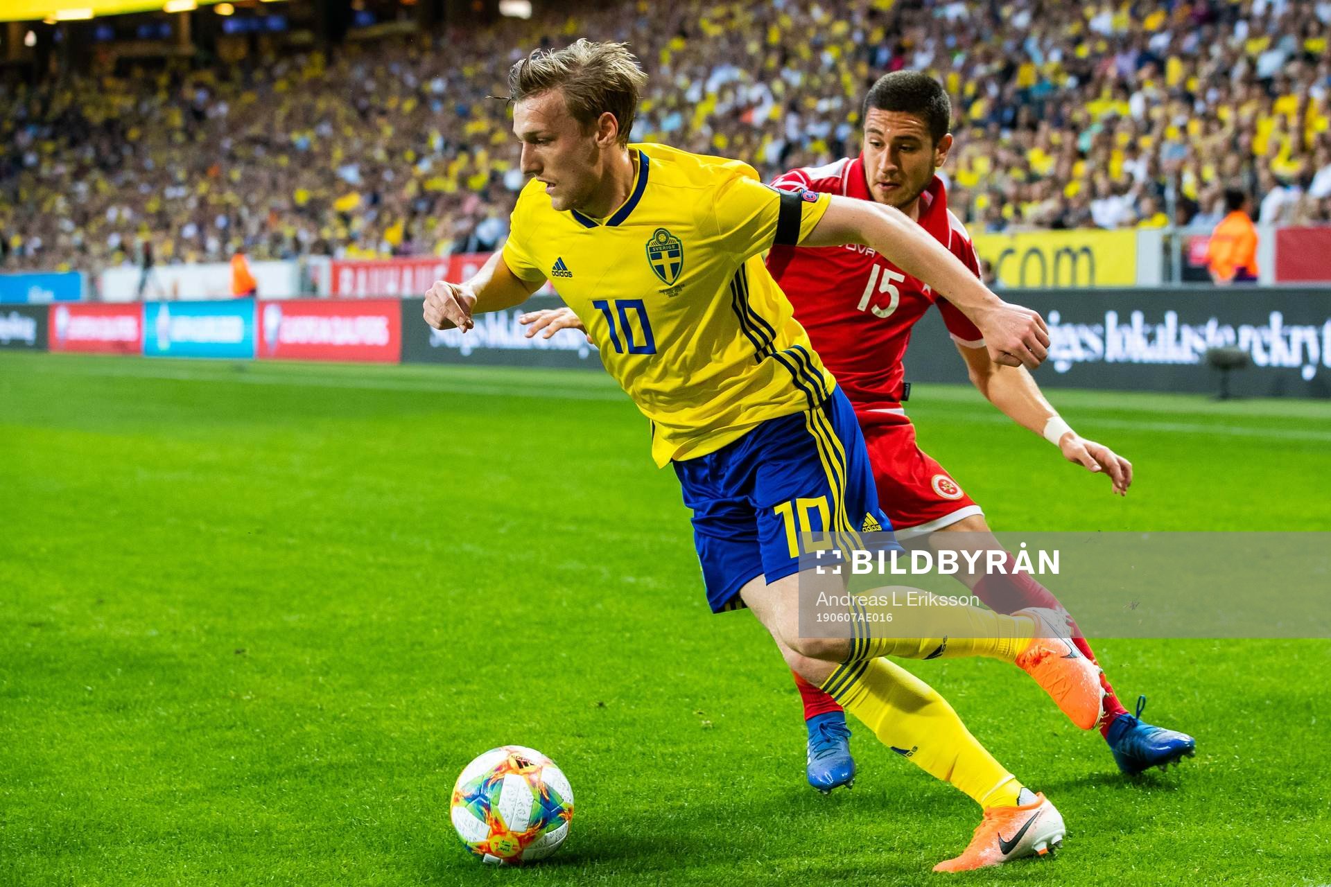 Emil Forsberg of Sweden and Ryan Fenech of Malta