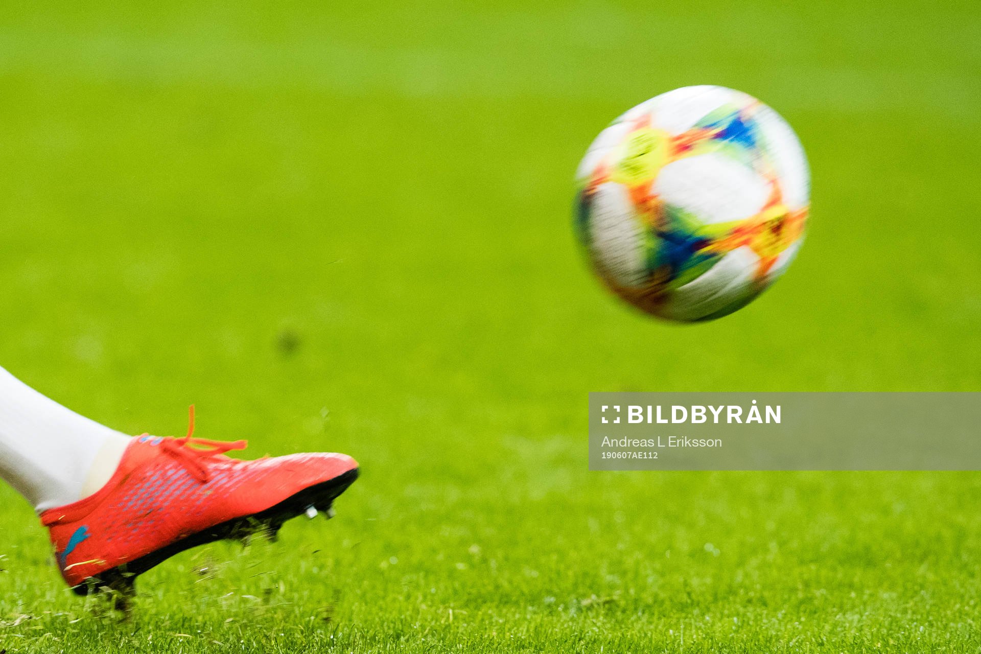 A player kicking the ball