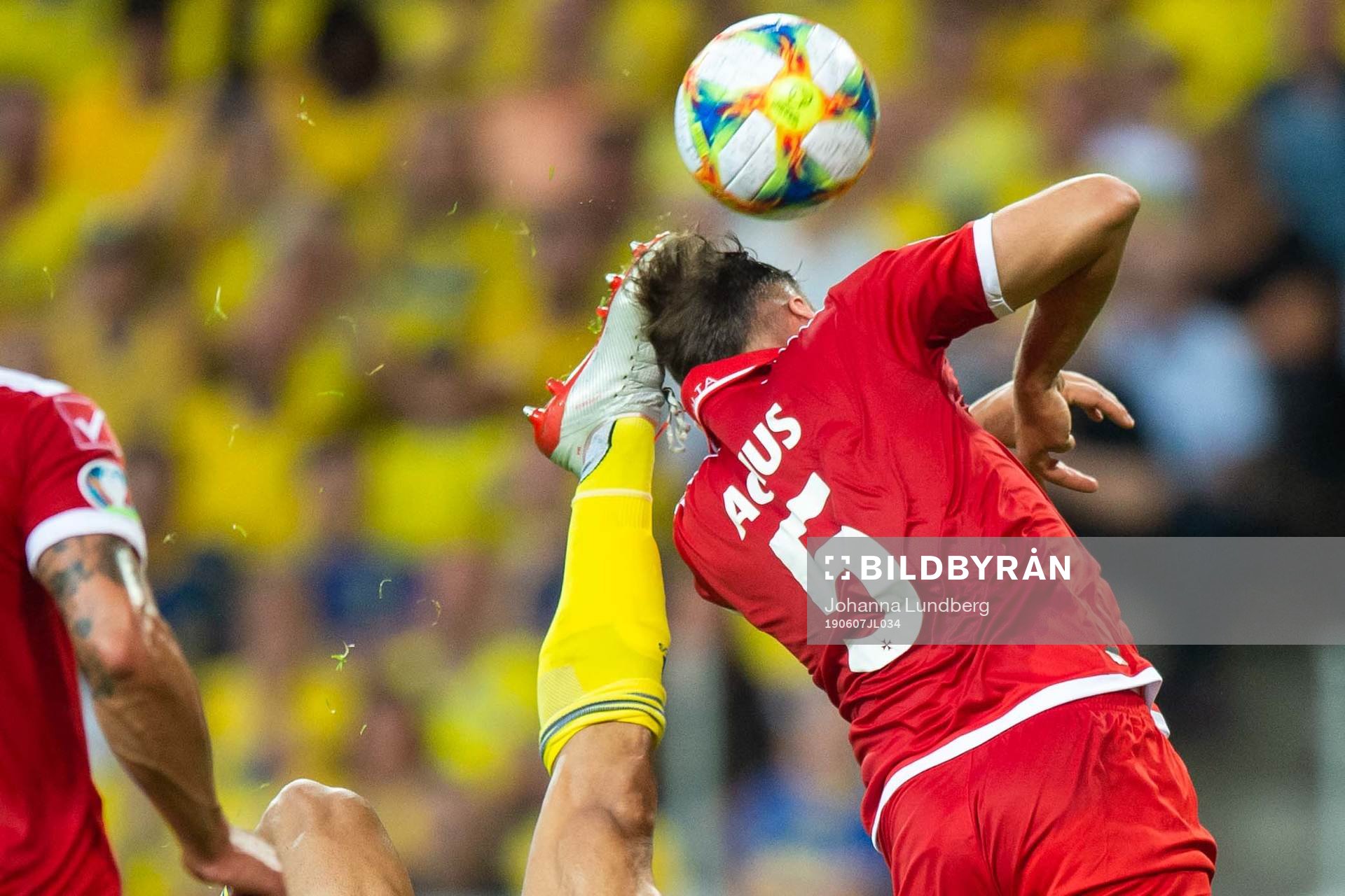 Robin Quaison of Sweden with a bicycle kick against