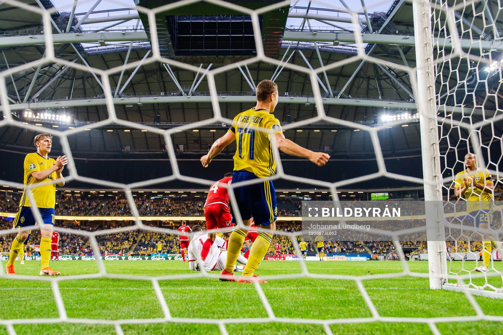 Viktor Claesson celebrate with Emil Forsberg and Robin