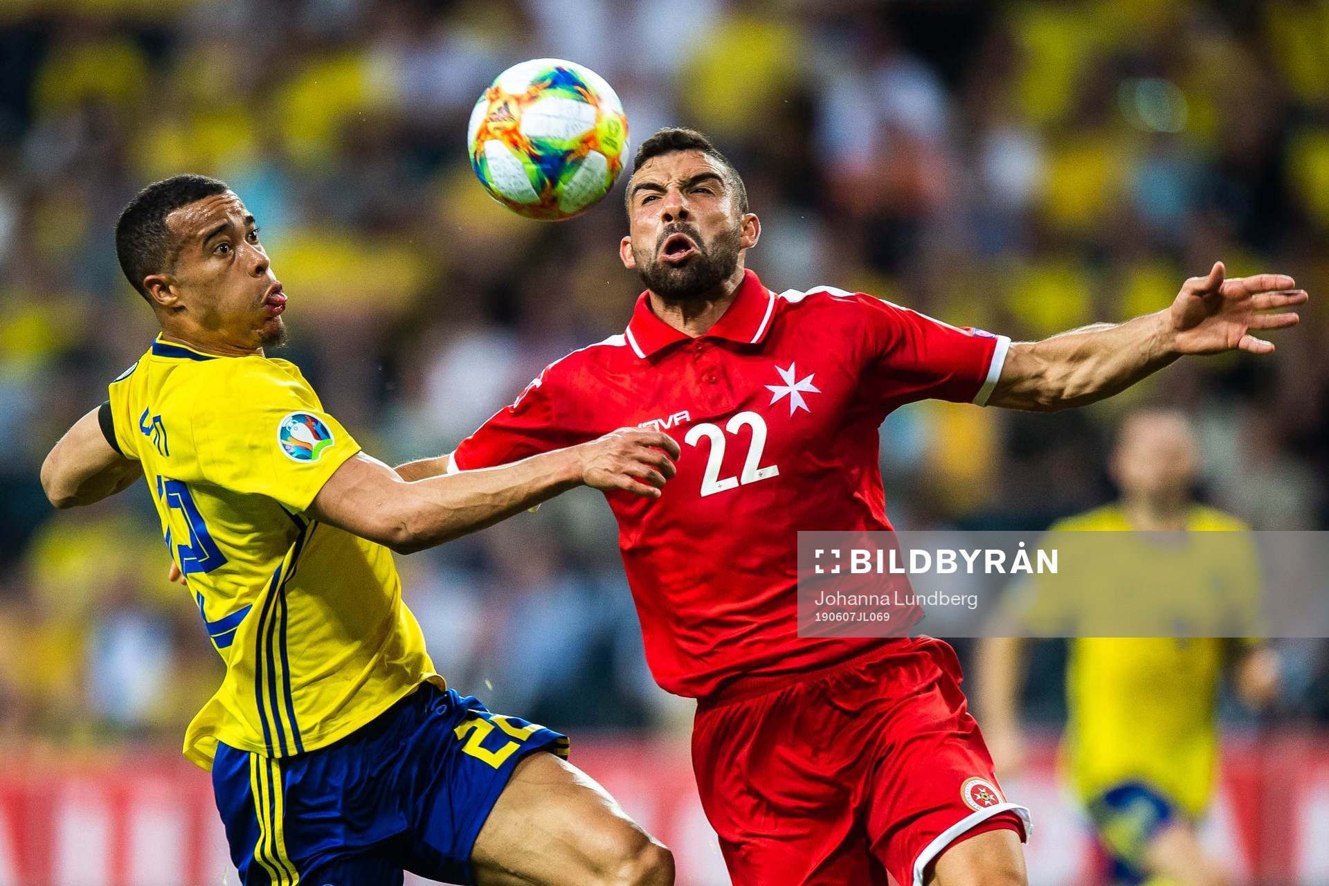 Robin Quaison of Sweden and Alfred Effiong of Malta