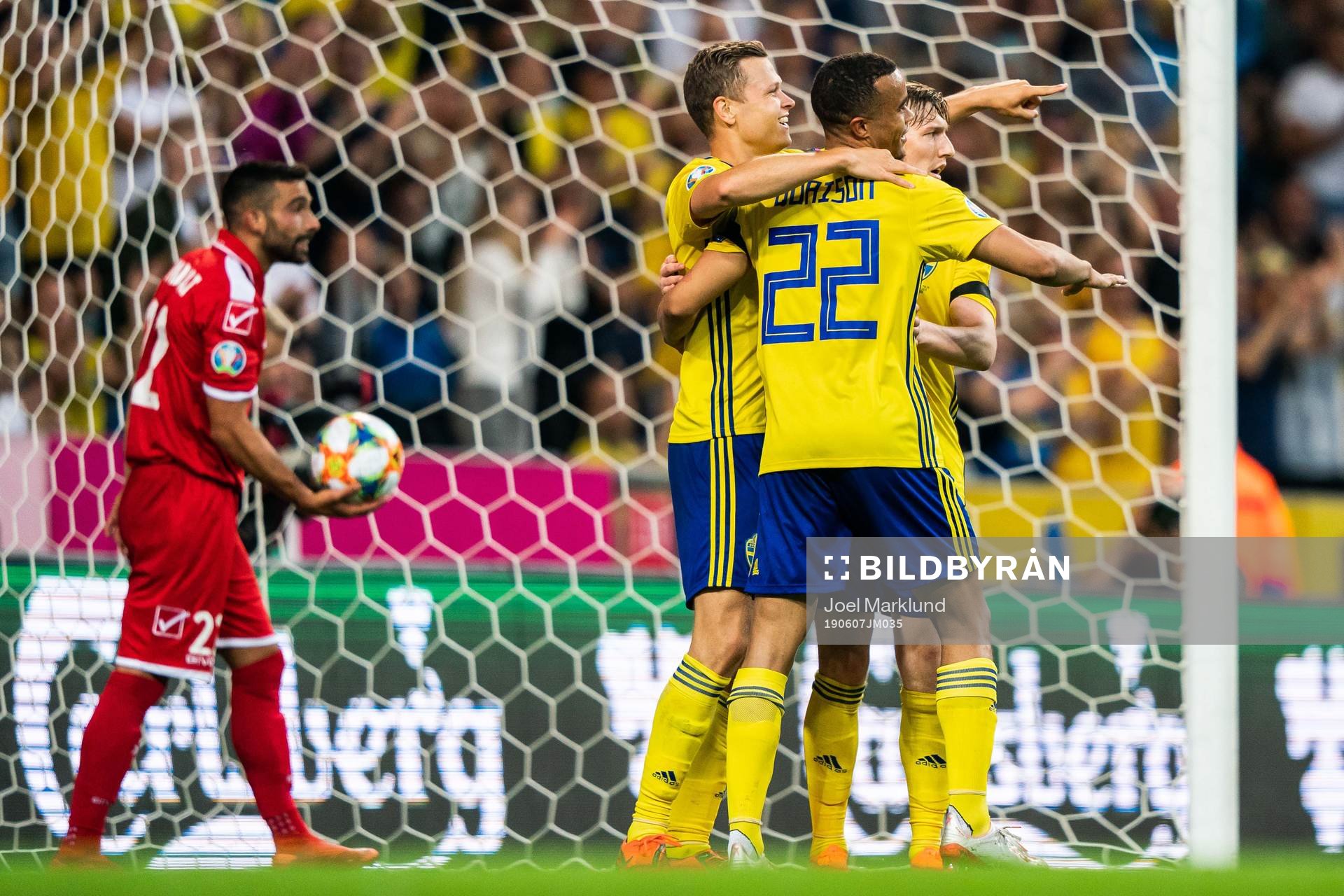 Viktor Claesson celebrate with Robin Quaison and Marcus Berg