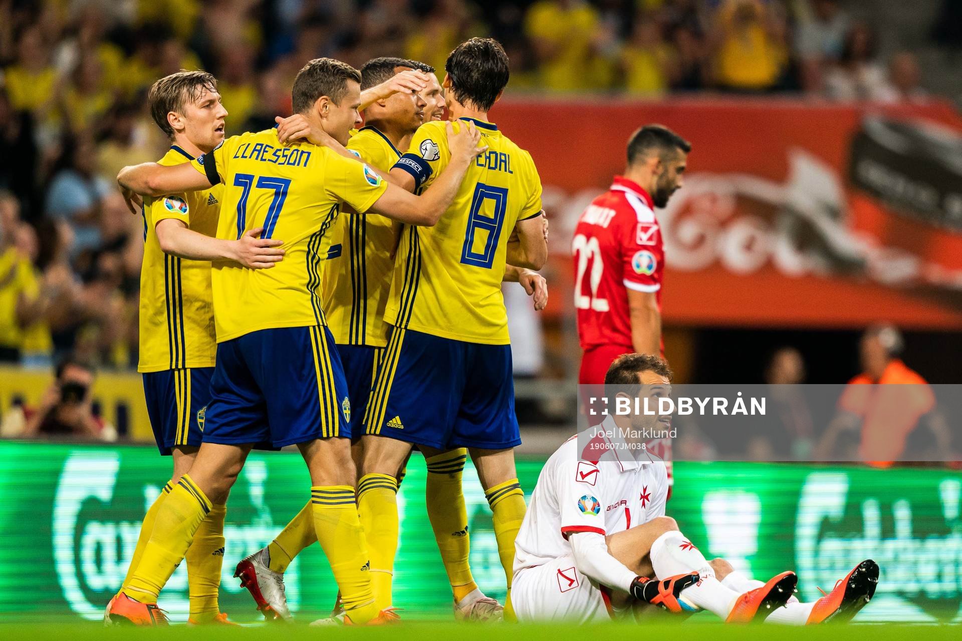 Viktor Claesson of Sweden celebrate with Robin Quaison and